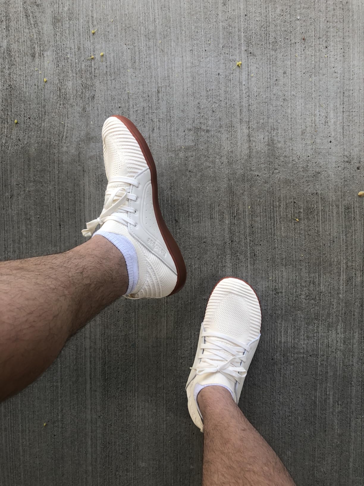 Close-up of Relxfeet barefoot shoe showing knit mesh upper construction and flexible rubber sole detail