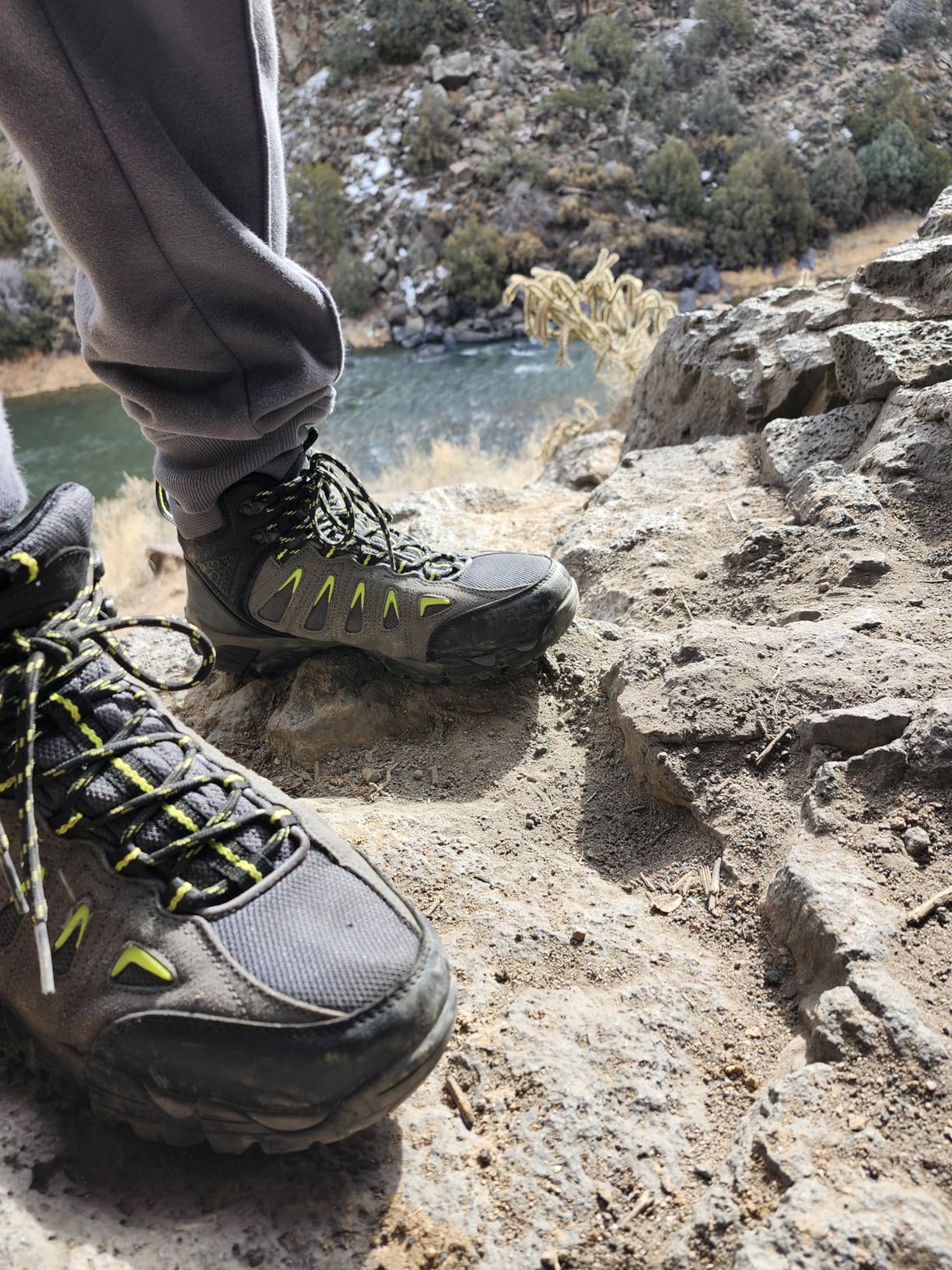 SHULOOK hiking boots being tested during outdoor hiking across varied terrain
