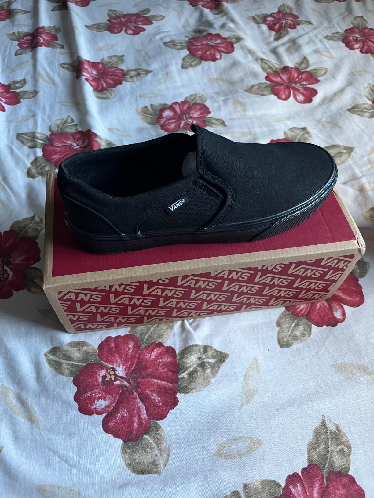 Vans Women's Asher Slip-On black and white canvas slip-on sneakers product view