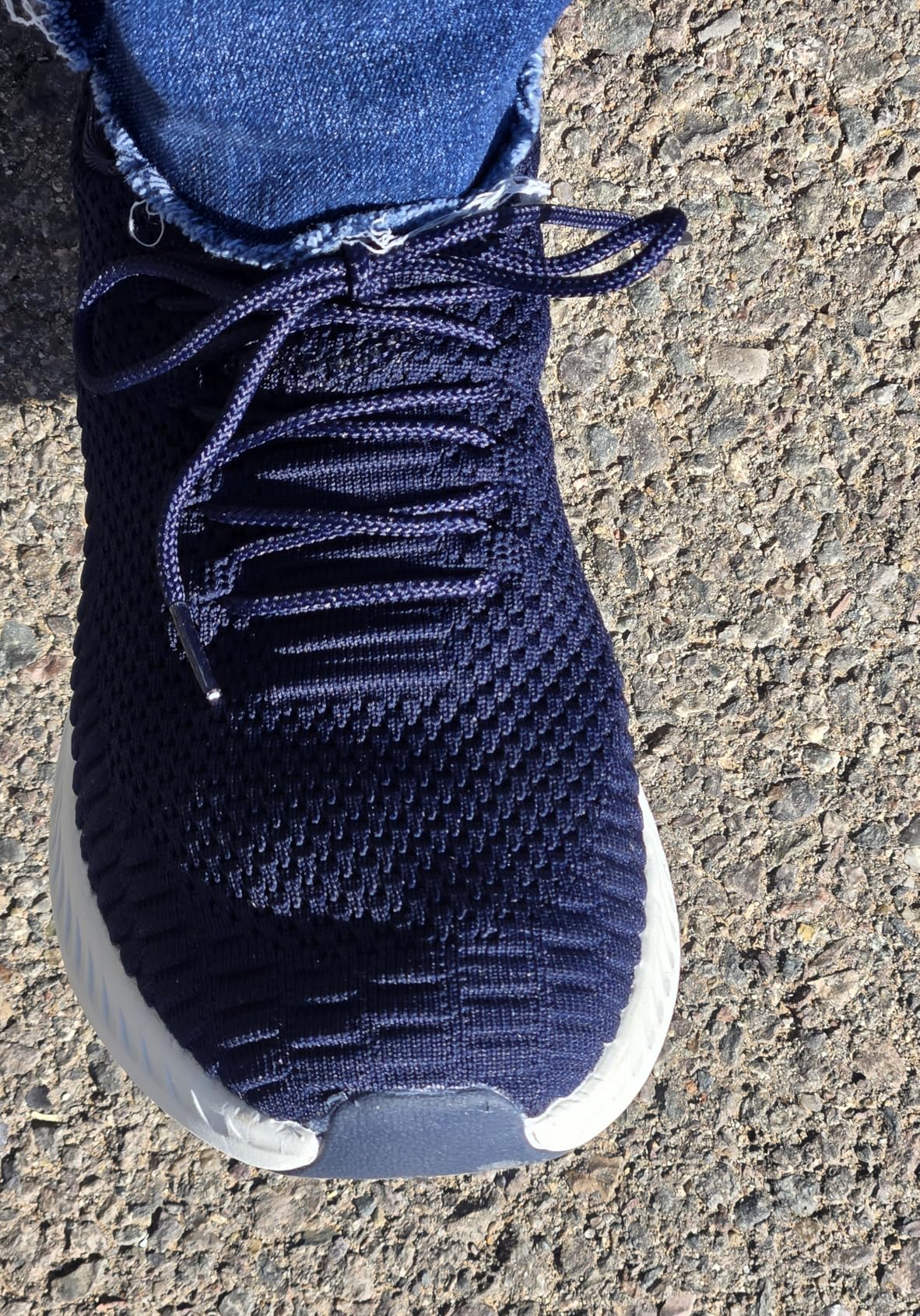 Navy blue Feethit women's sneakers showing clean colorway and design from front angle