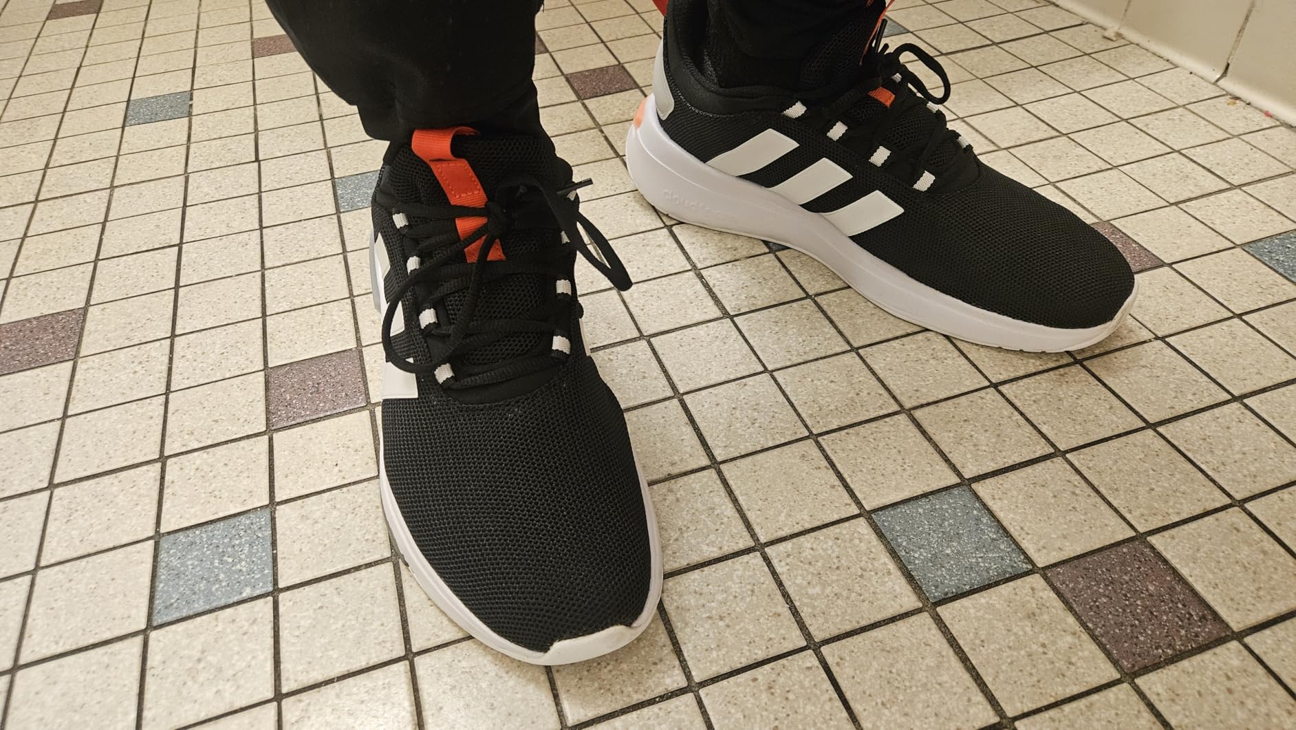Bottom view of Adidas Racer TR23 showing all-rubber outsole and diagonal traction pattern