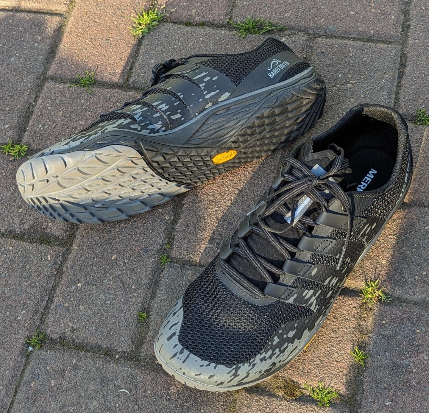 Merrell Trail Glove 5 mesh upper and lacing system showing fit structure