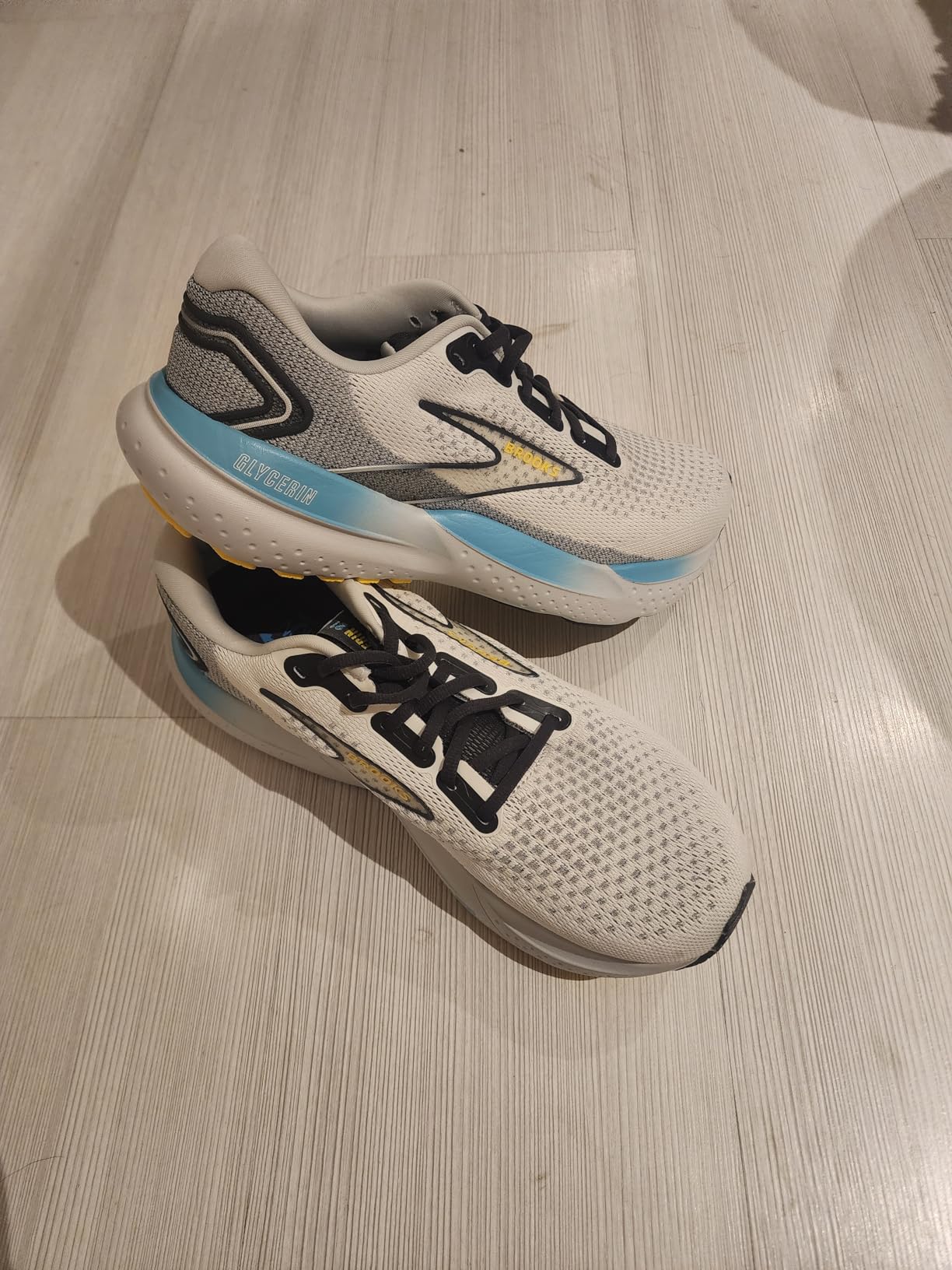 Brooks Glycerin 21 in action during road running showing natural heel-to-toe transition and stride mechanics