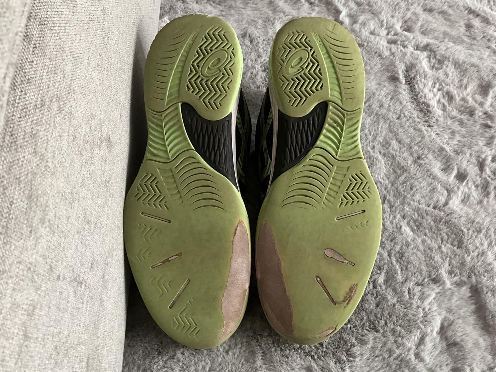 Detailed view of sole wear pattern showing durability issues after intensive pickleball use