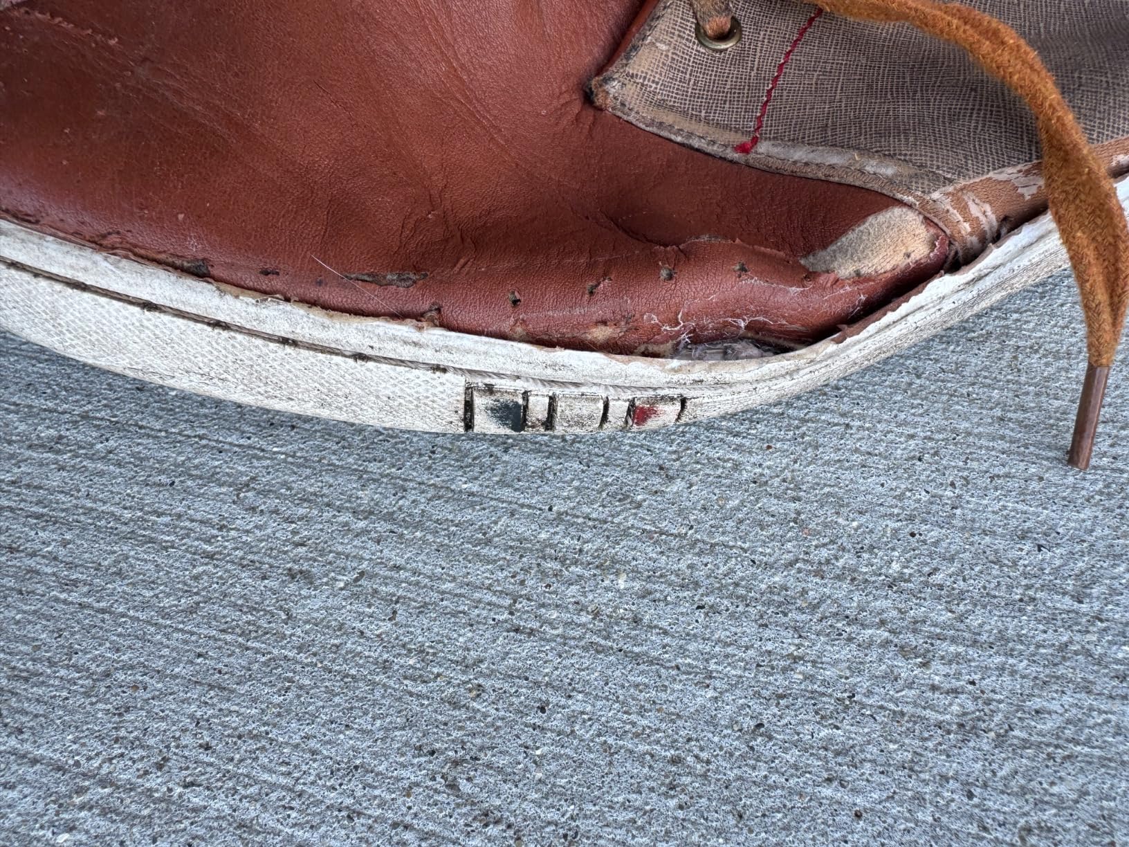 Side profile of Bruno Marc fashion sneakers showing sleek silhouette and sole construction
