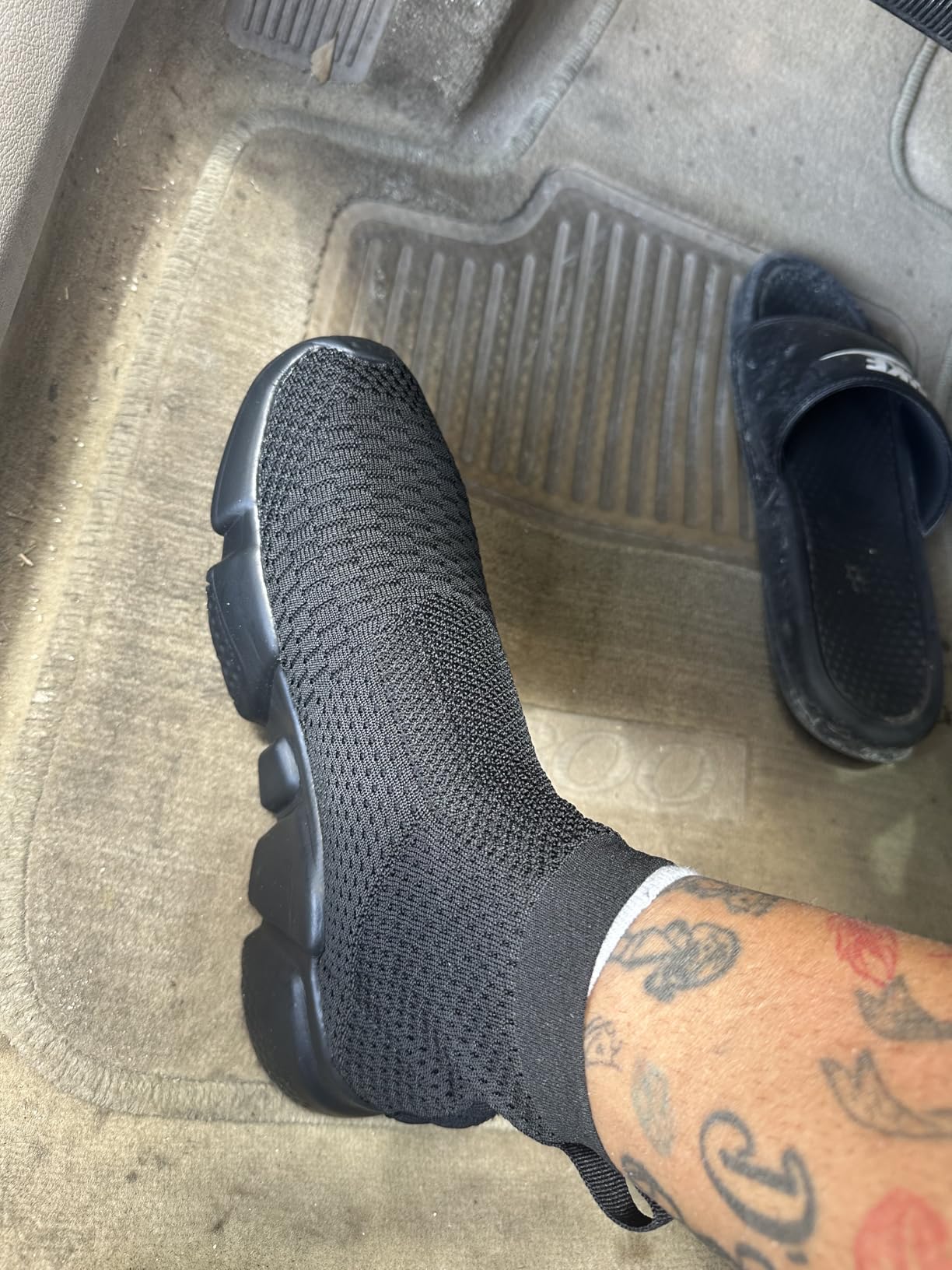 Close-up detail of Santiro knit upper showing breathable mesh material and high-top construction