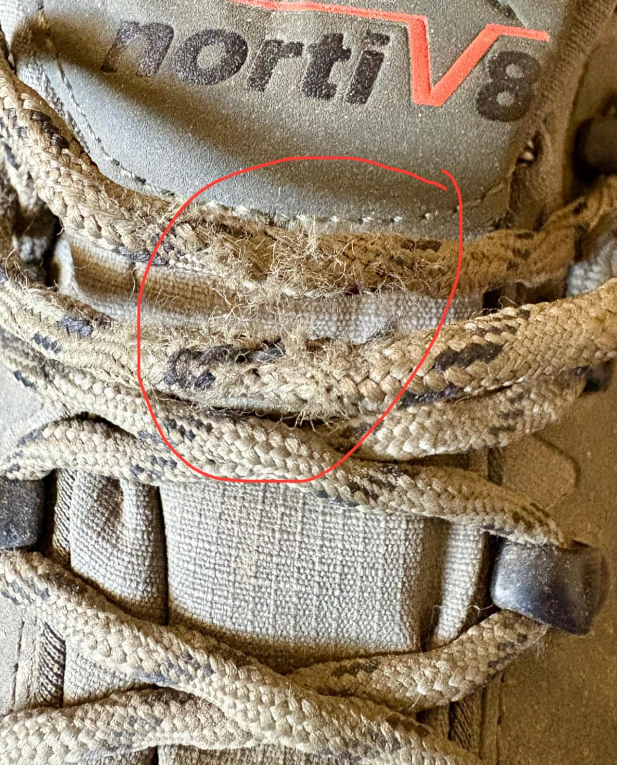 Macro view of NORTIV 8 hiking shoe rubber outsole showing MDT traction pattern detail