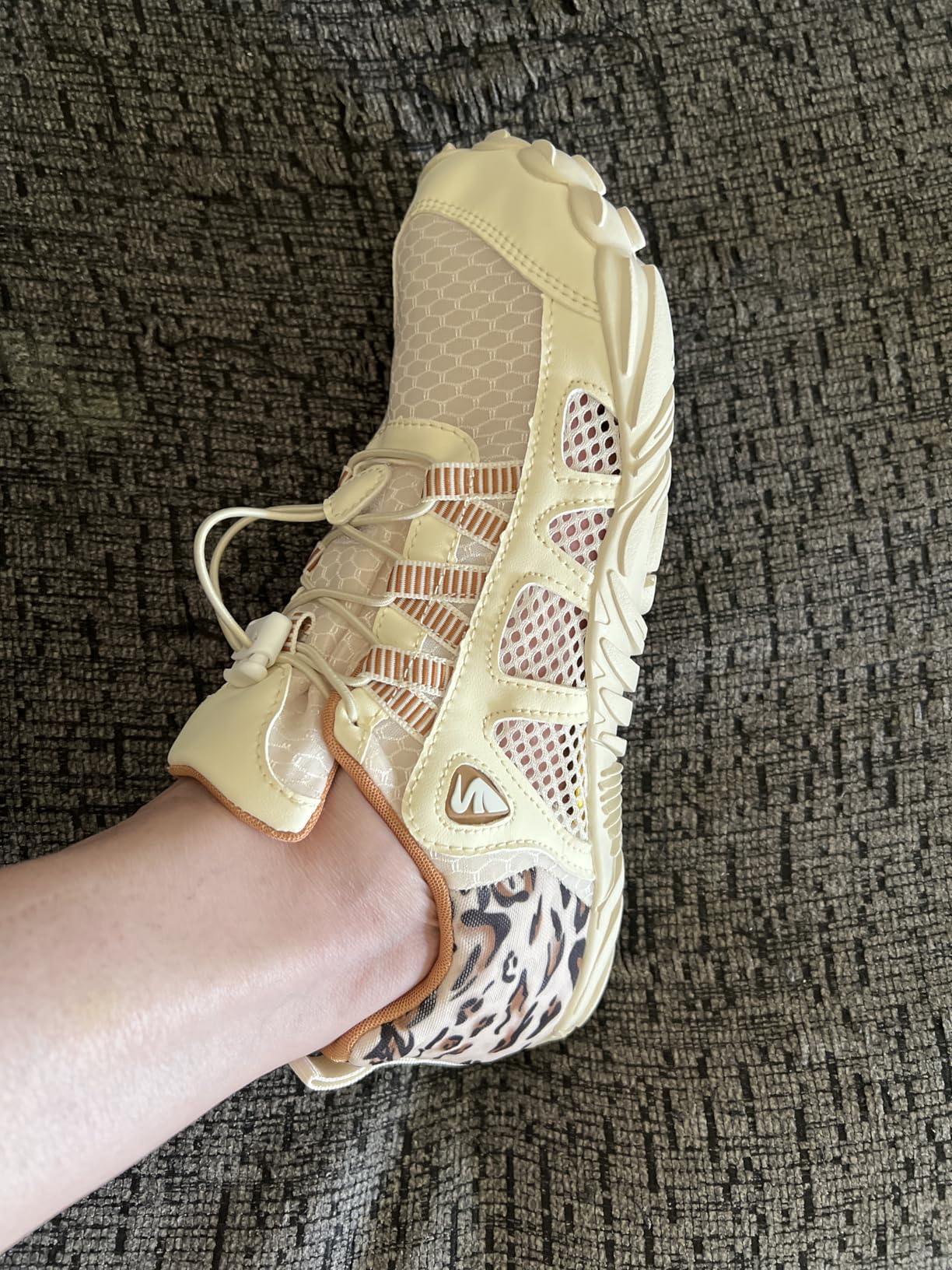 Close-up of XIHALOOK water shoes showing elastic lacing system and wide toe box design