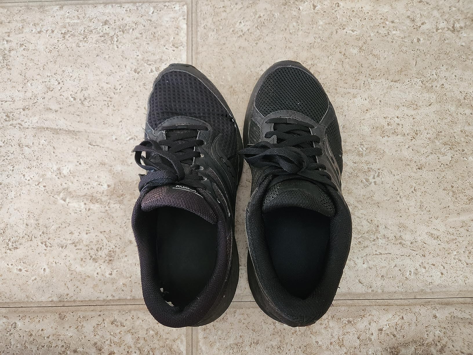 Saucony Cohesion 14 TR outsole pattern showing 6mm lugs and rubber compound for trail traction