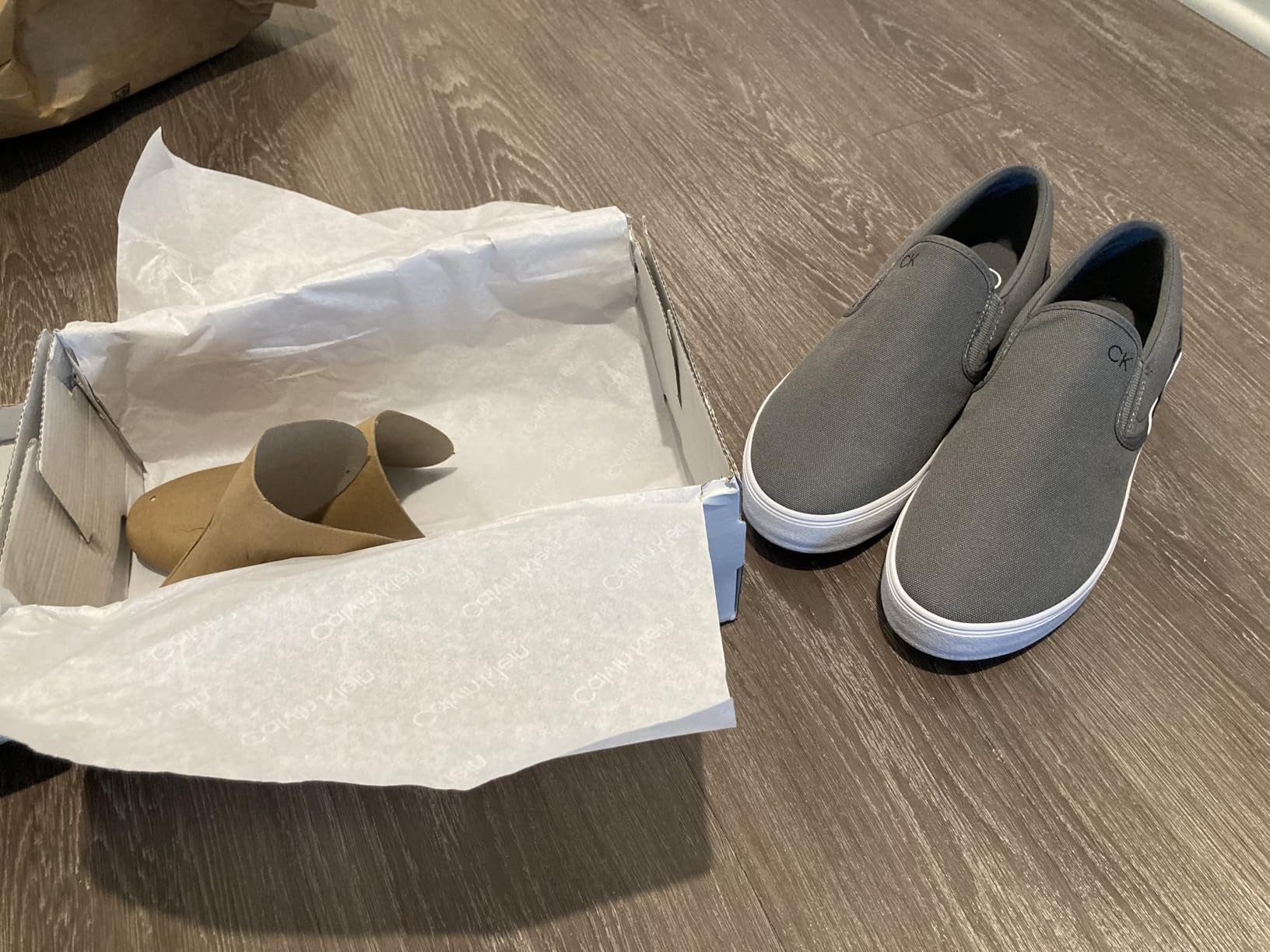 Close-up of Calvin Klein sneaker construction and wear points