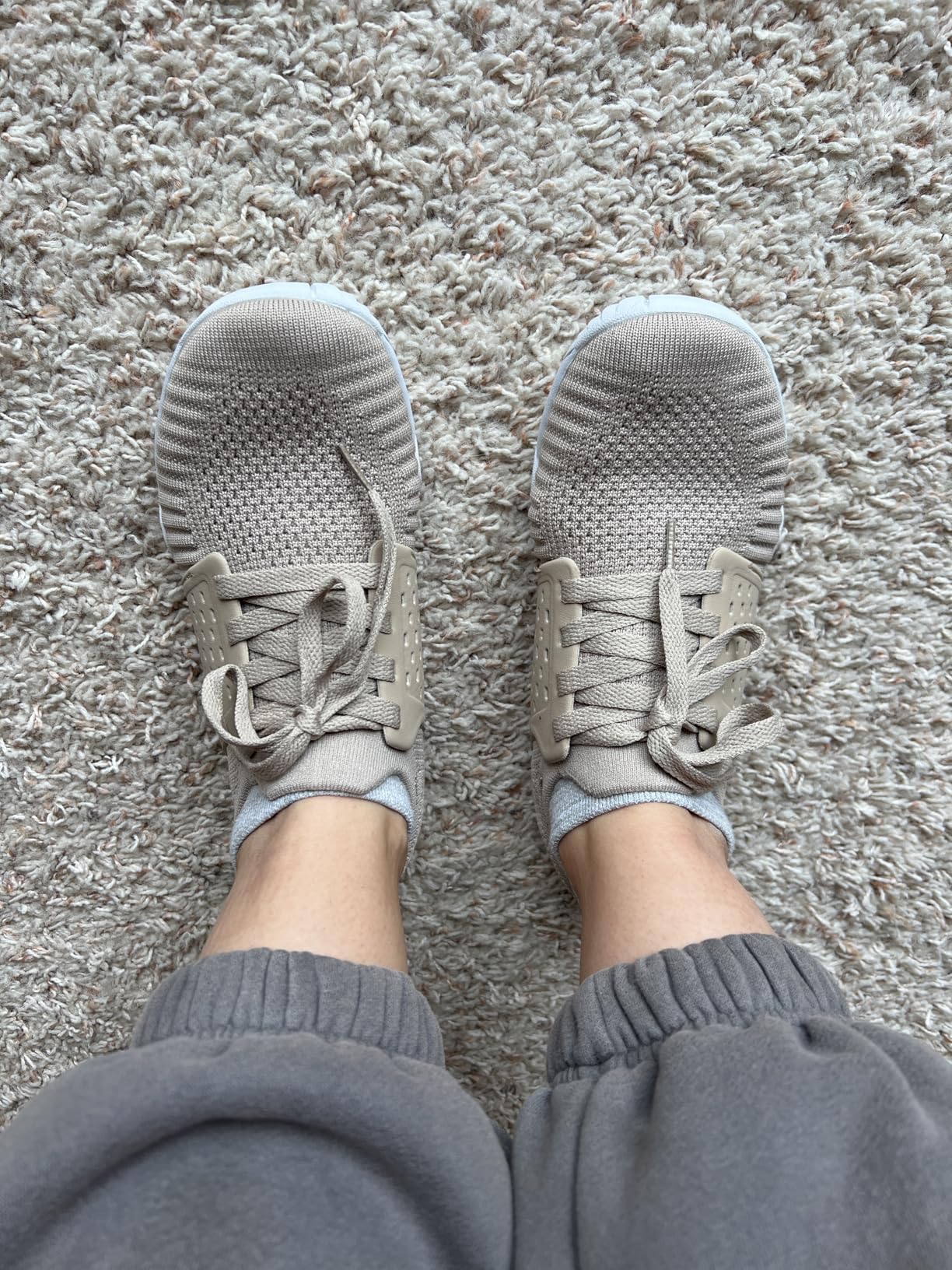 Woman wearing WHITIN barefoot shoes during casual daily activities