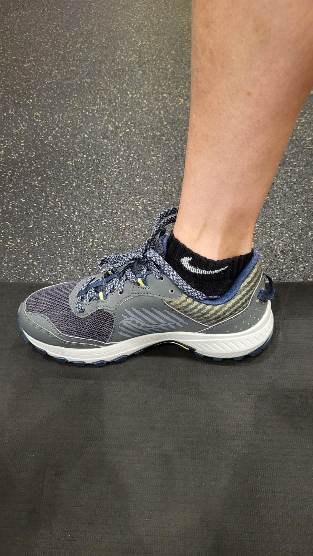 Saucony Excursion TR15 outsole detail showing aggressive carbon rubber lug pattern for trail traction