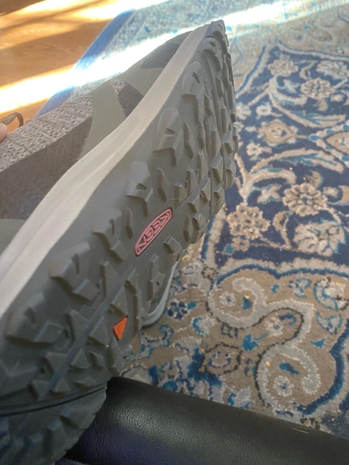 KEEN Terradora 2 hiking shoes in action on rocky wet trail showing traction and waterproof performance