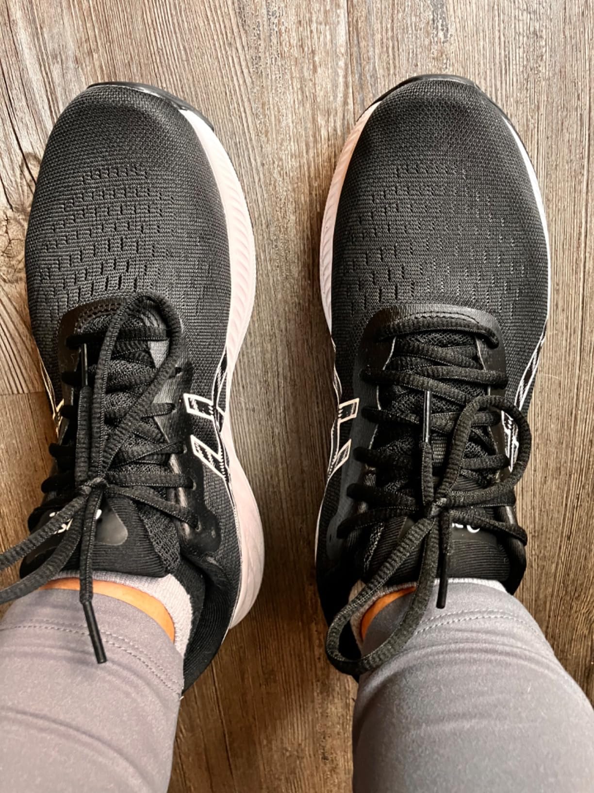 Close-up of ASICS Gel-Excite 9 engineered jacquard mesh upper showing texture and construction detail
