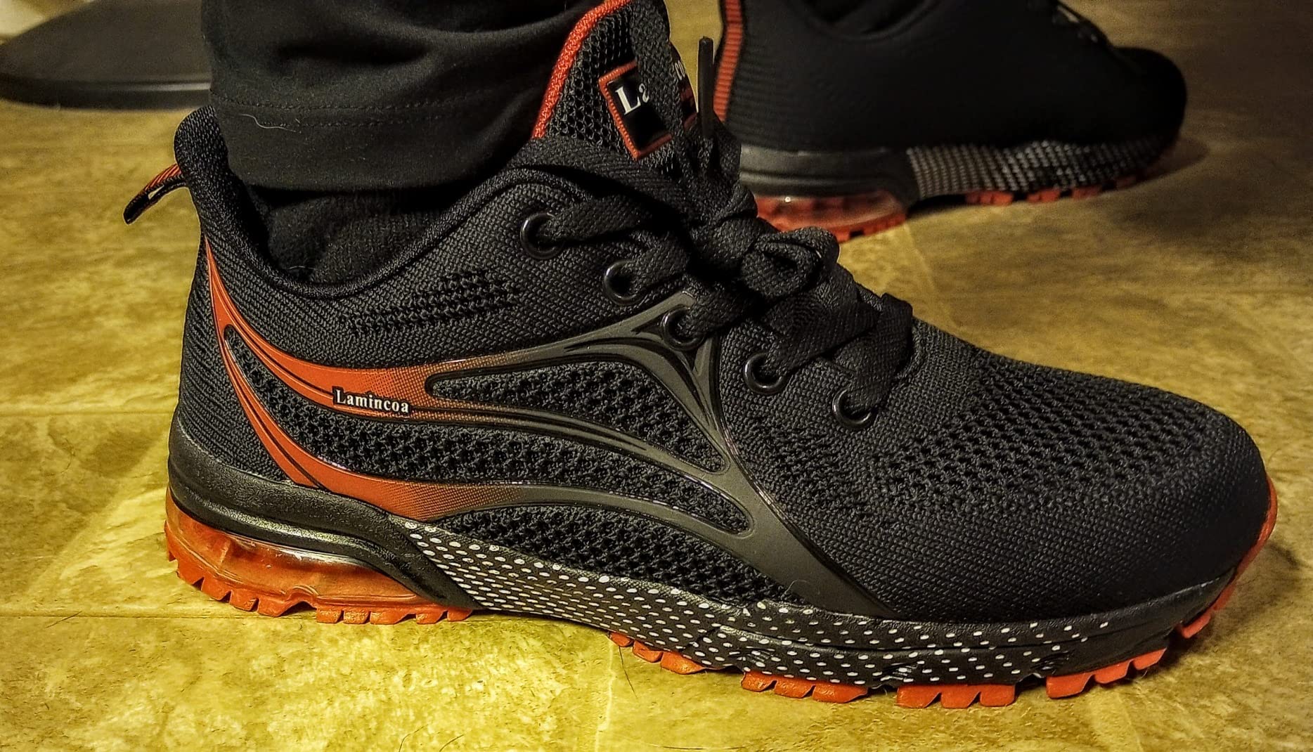 Close-up of Lamincoa women's shoes showing knitted mesh upper texture and lacing system detail