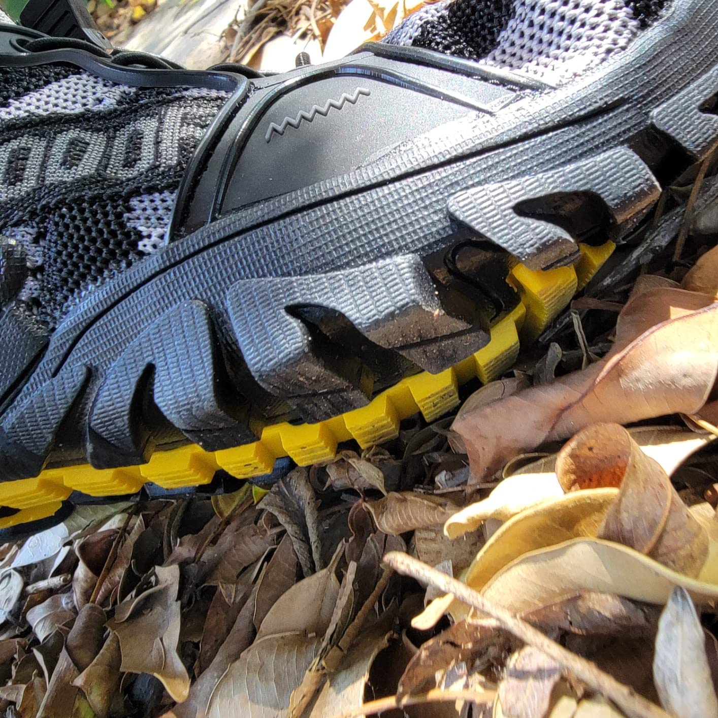 Bottom sole of TANGYUGEN water shoes showing anti-slip rubber EPTU tread pattern and drainage design