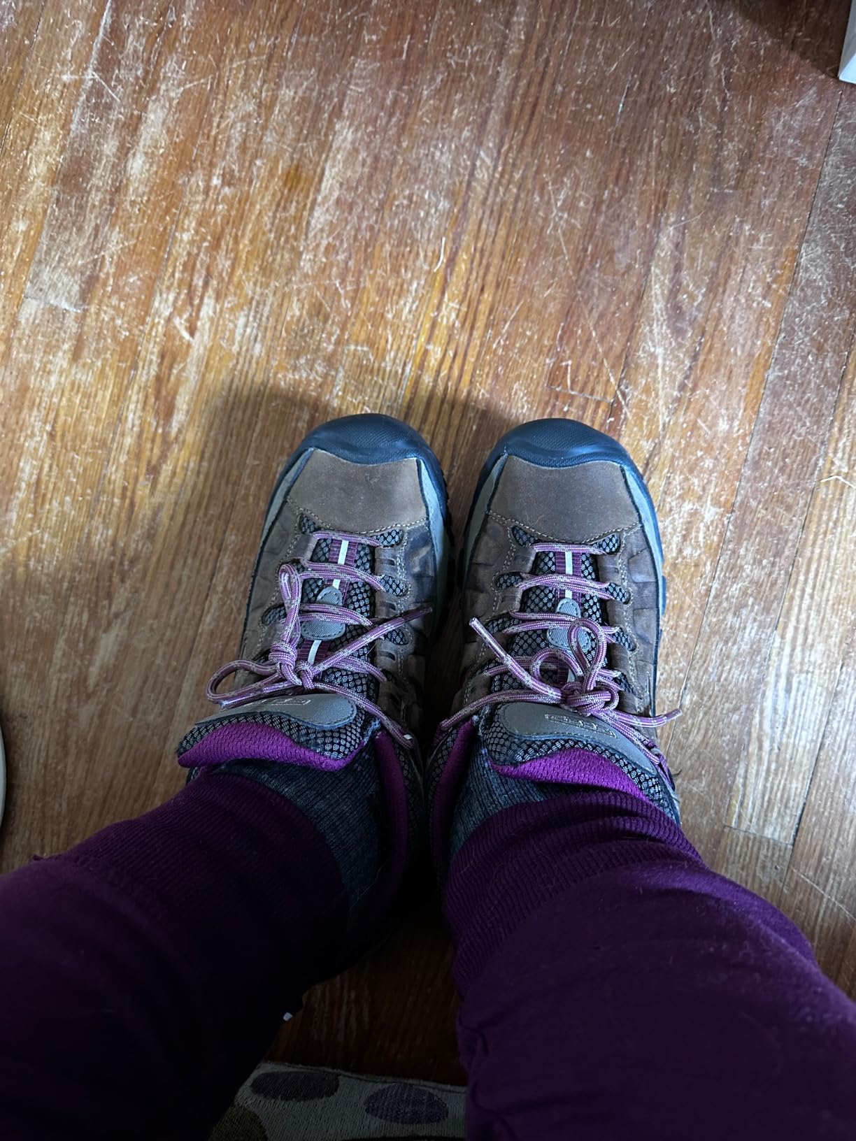 Close-up of KEEN Women's Targhee III construction showing oiled nubuck leather upper and signature rubber toe protection