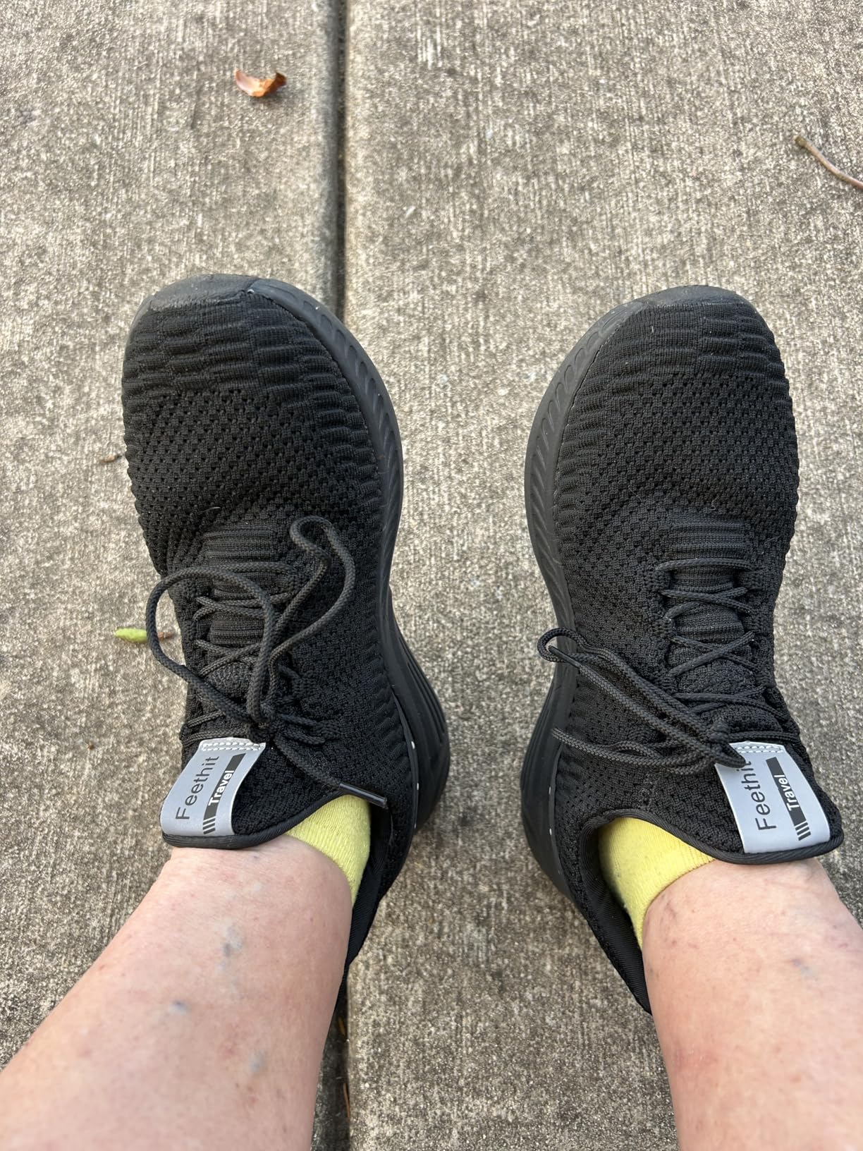 Bottom sole view of Feethit shoes showing EVA outsole traction pattern and rubber patch design