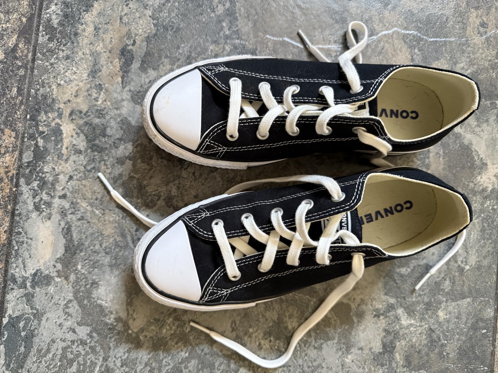 Handshop off-white shoelaces on aged sneakers showing how off-white color matches yellowed soles better than bright white