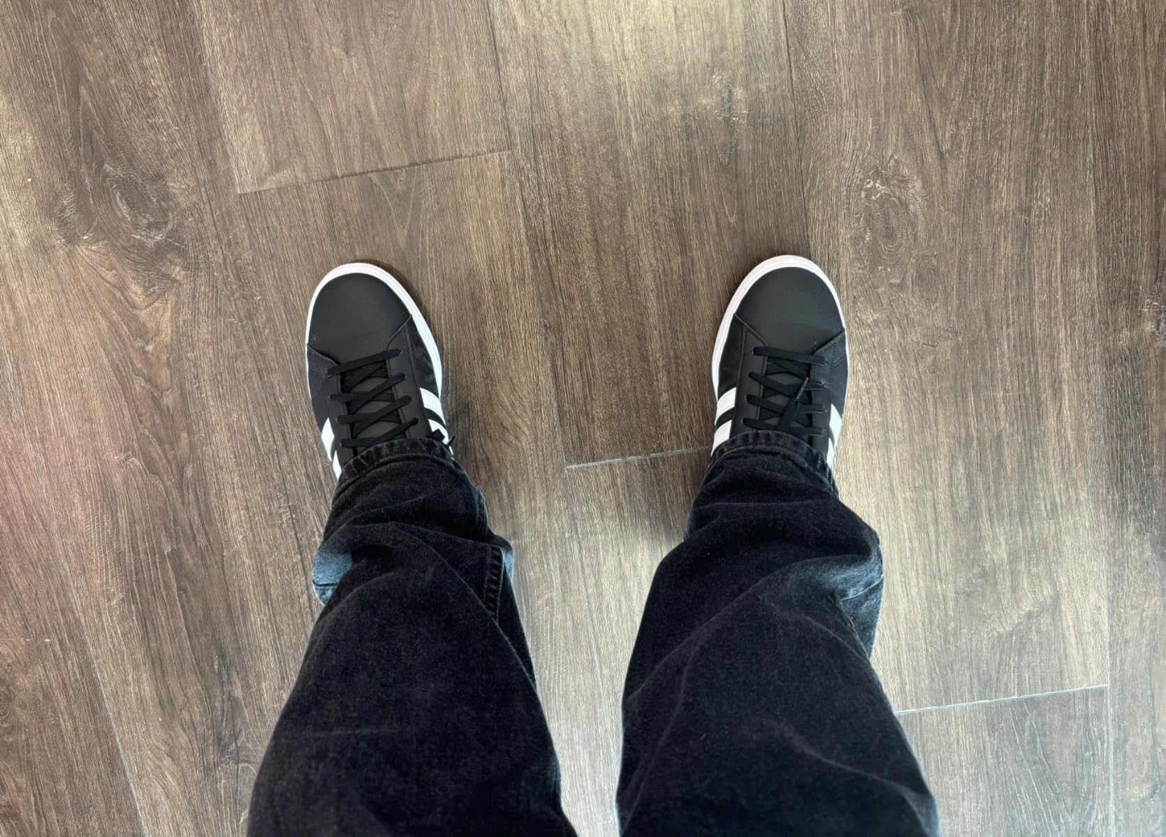 Adidas Grand Court 2.0 lifestyle shot showing versatile casual wear and clean classic aesthetic