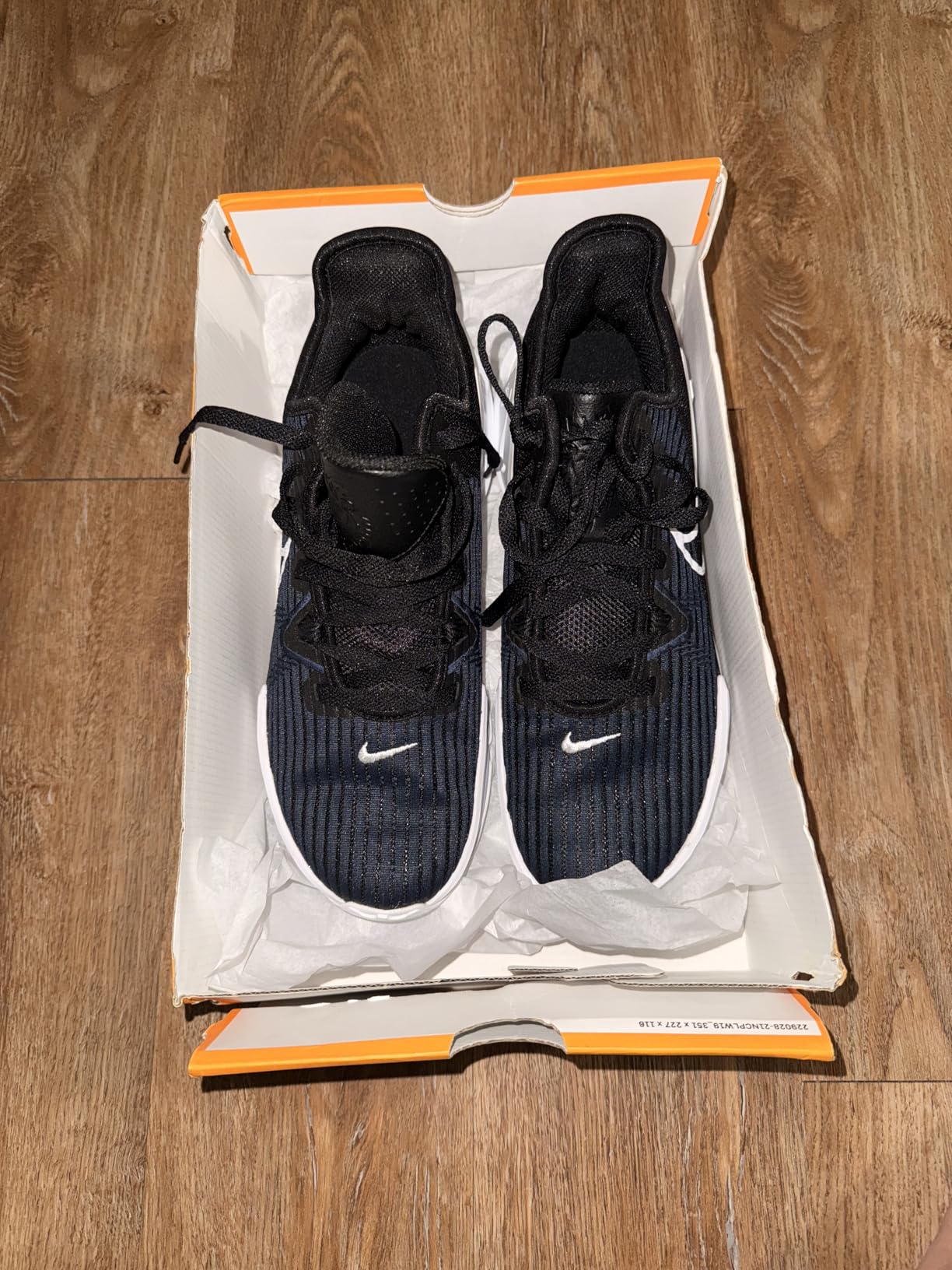 Nike LeBron Witness VI on court during basketball play showing herringbone traction and lateral stability performance