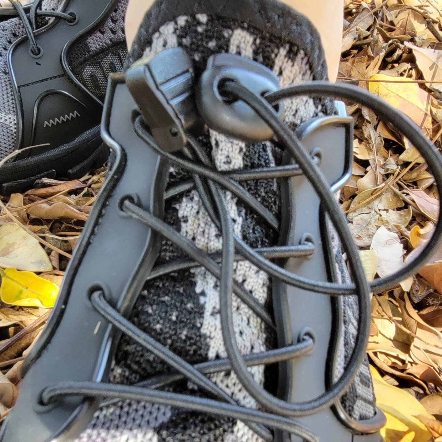 TANGYUGEN water shoes worn outdoors in real-world use showing fit and performance context