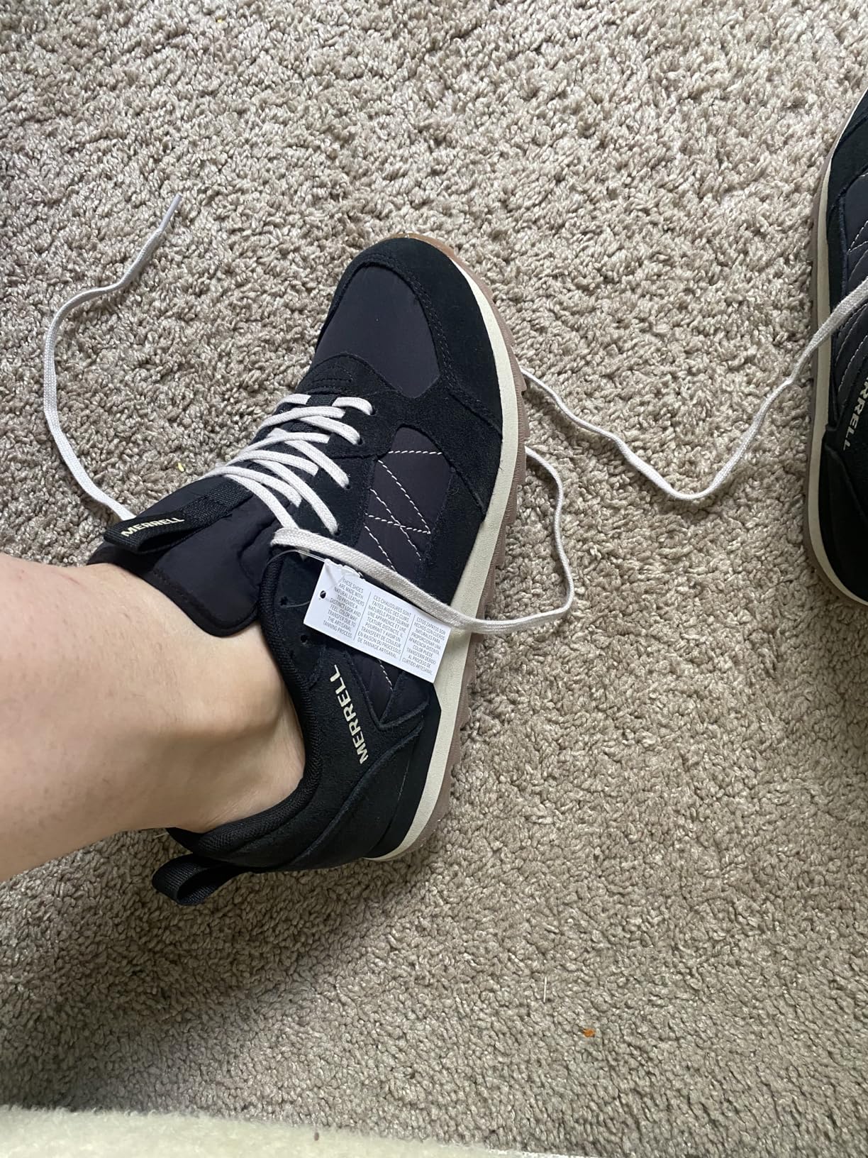 Merrell Alpine Sneaker on wet surface showing traction performance concerns