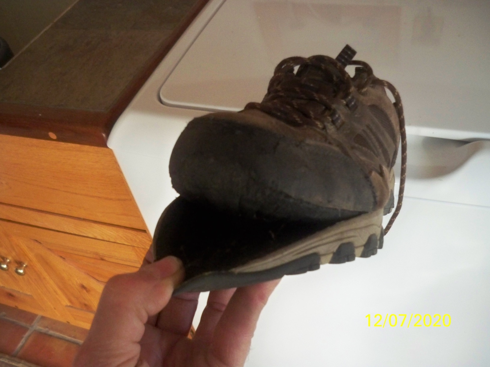 Close-up of Skechers Selmen-Enago upper construction showing waterproof leather panels and synthetic overlays