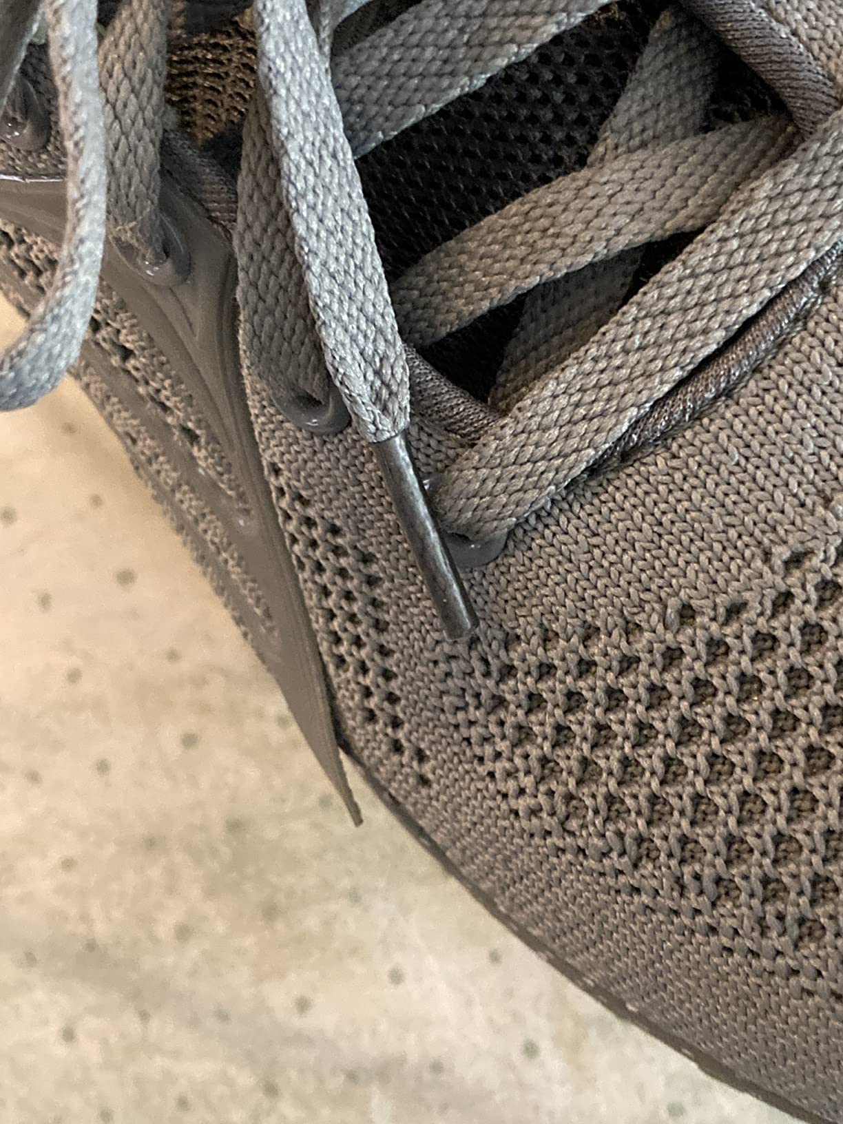 Detail shot showing plastic design elements and mesh material flexibility construction of Lamincoa women's shoes