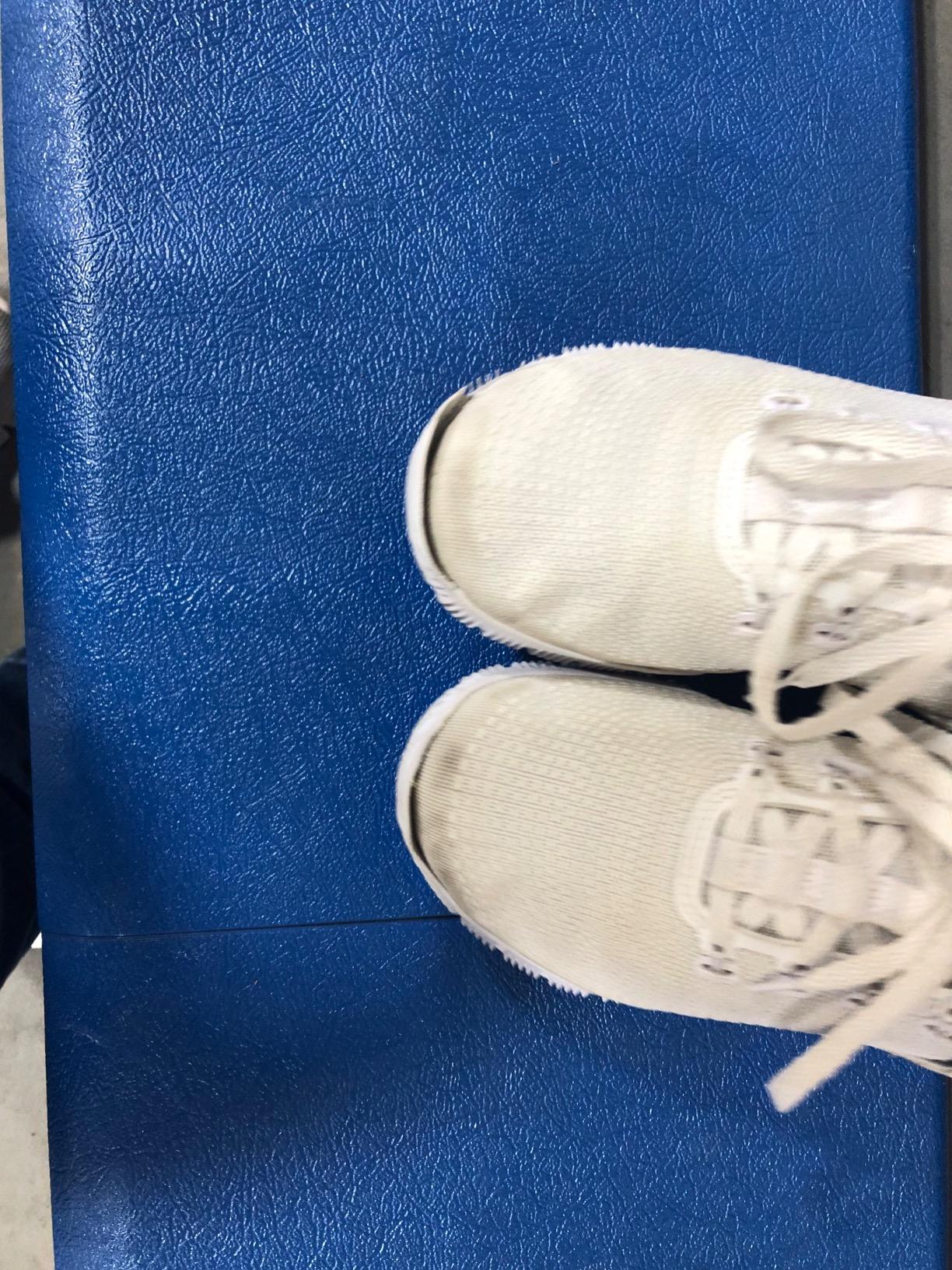 Close-up of sole separation detail on Nike volleyball shoes showing primary failure point at toe junction