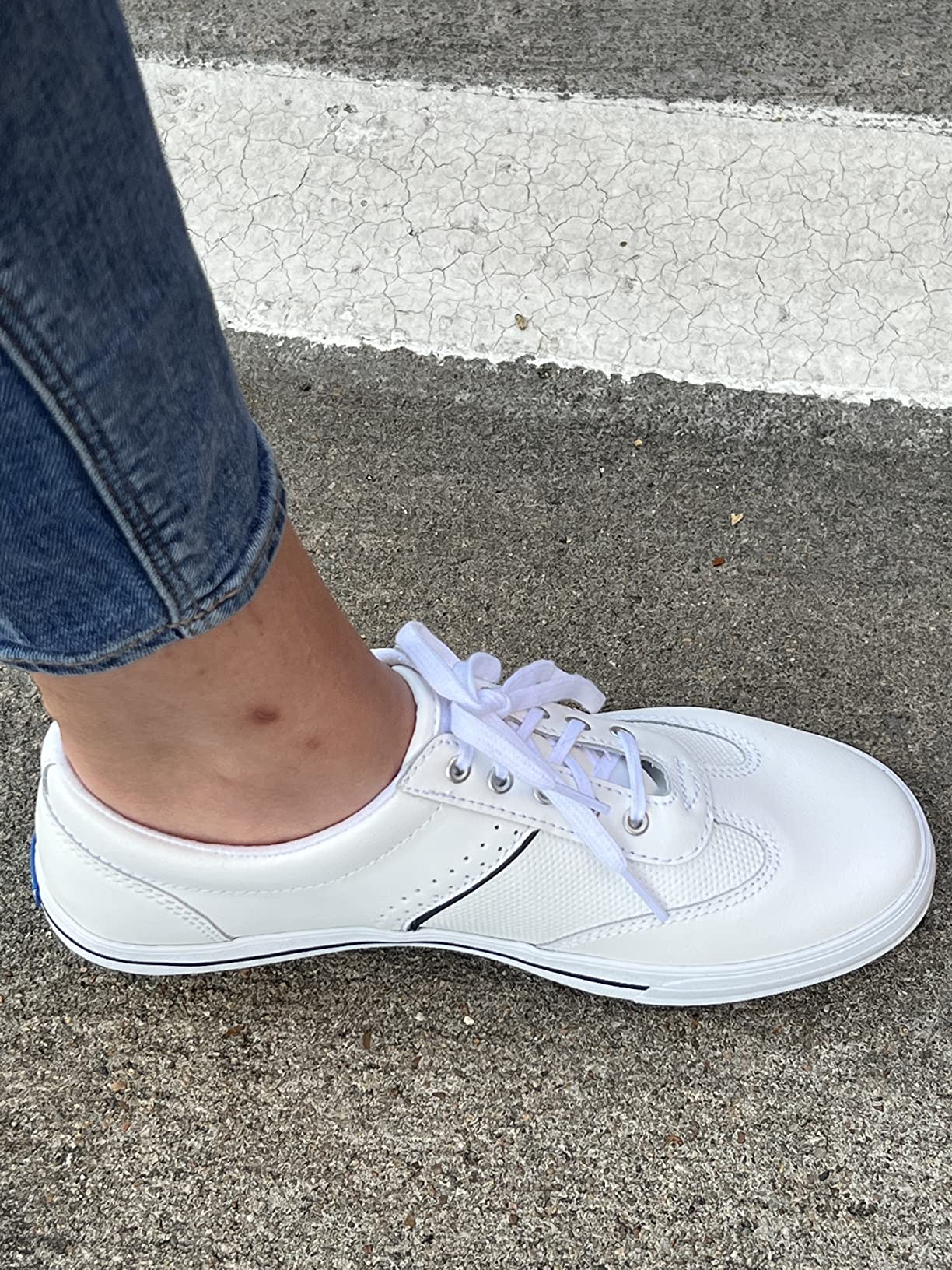 Side profile view of Keds Courty Core showing 1.5 inch platform height and Dream Foam cushioning