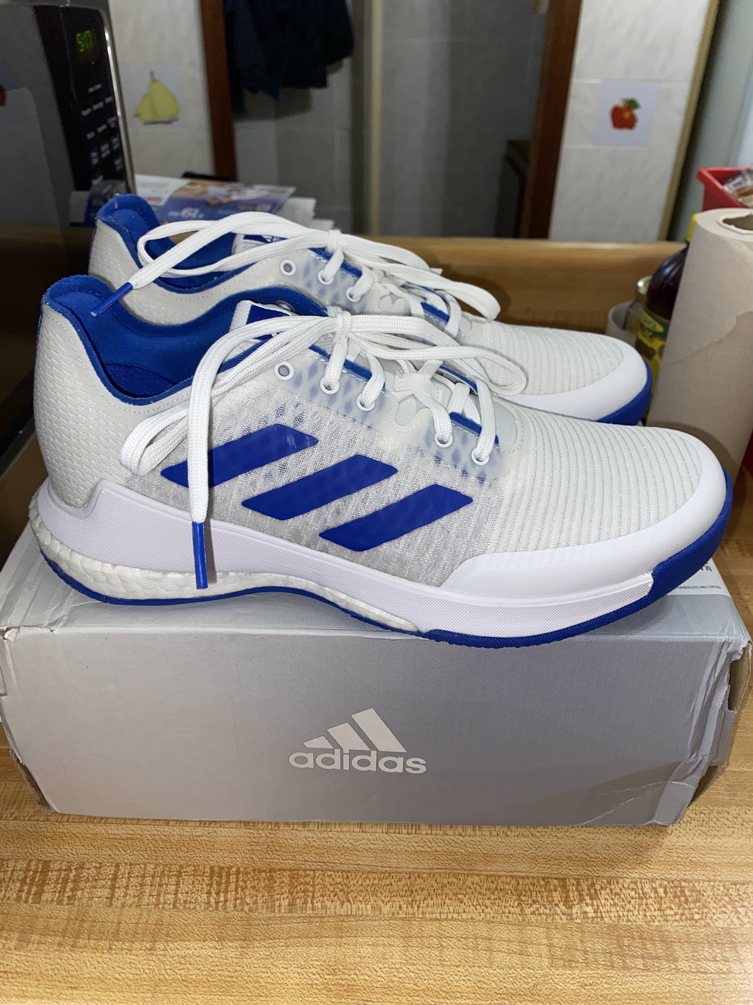 Adidas Crazyflight volleyball shoes outsole showing Top Grip asymmetrical rubber traction pattern for indoor courts