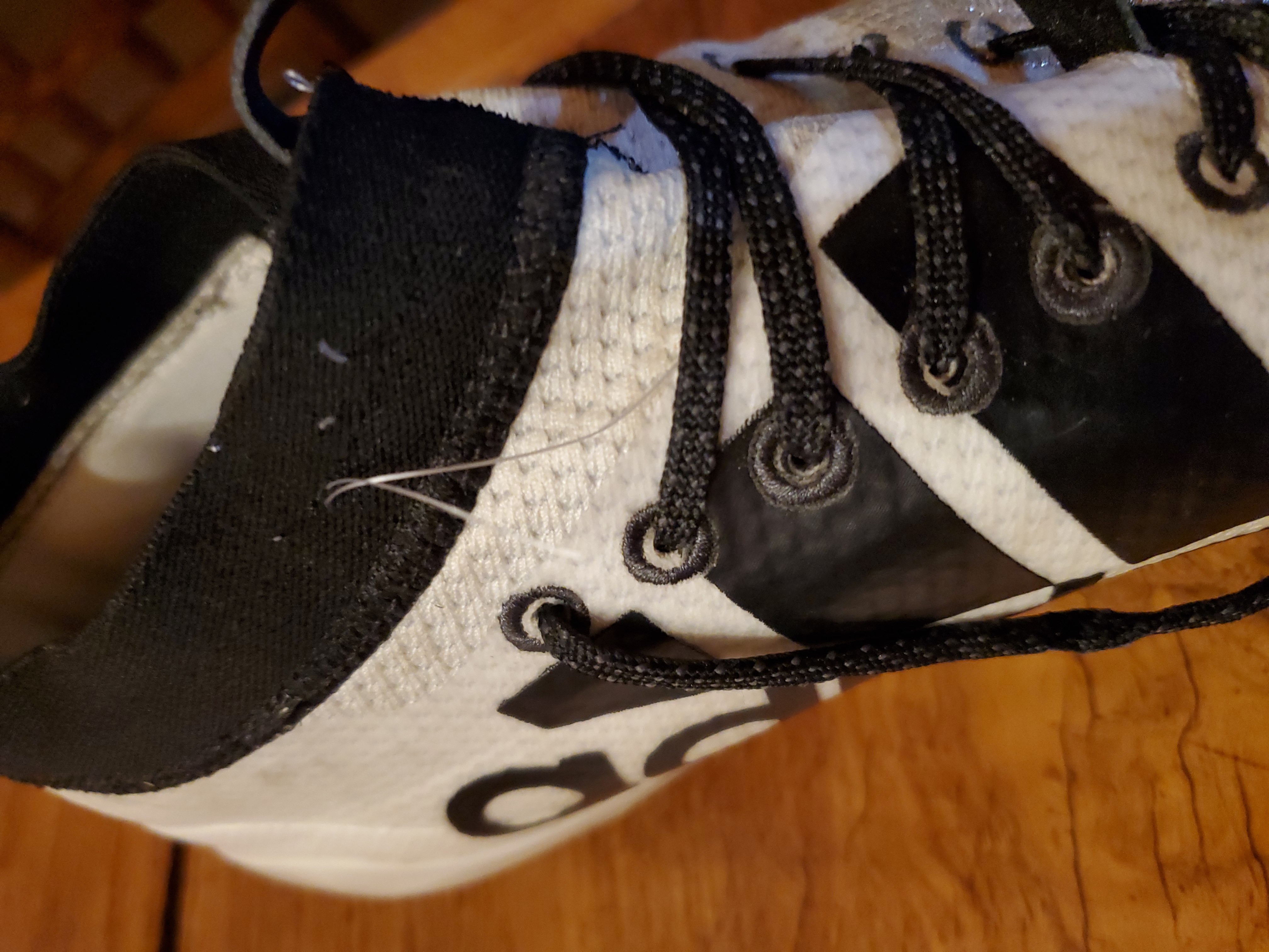 Football players wearing Adidas Adizero Scorch cleats in practice showing real-world high school performance