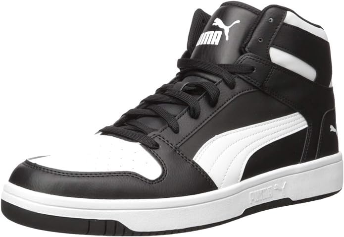 PUMA Rebound Layup in action during pickup basketball game showing mid-top ankle enclosure and rubber outsole court traction