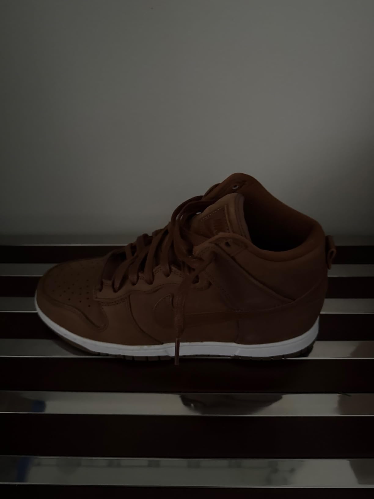 Nike Women's Dunk High perforated leather upper detail showing lace-up closure system