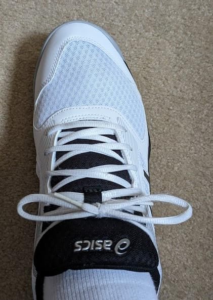 Bottom view ASICS Upcourt 5 showing non-marking gum rubber outsole traction pattern for indoor courts