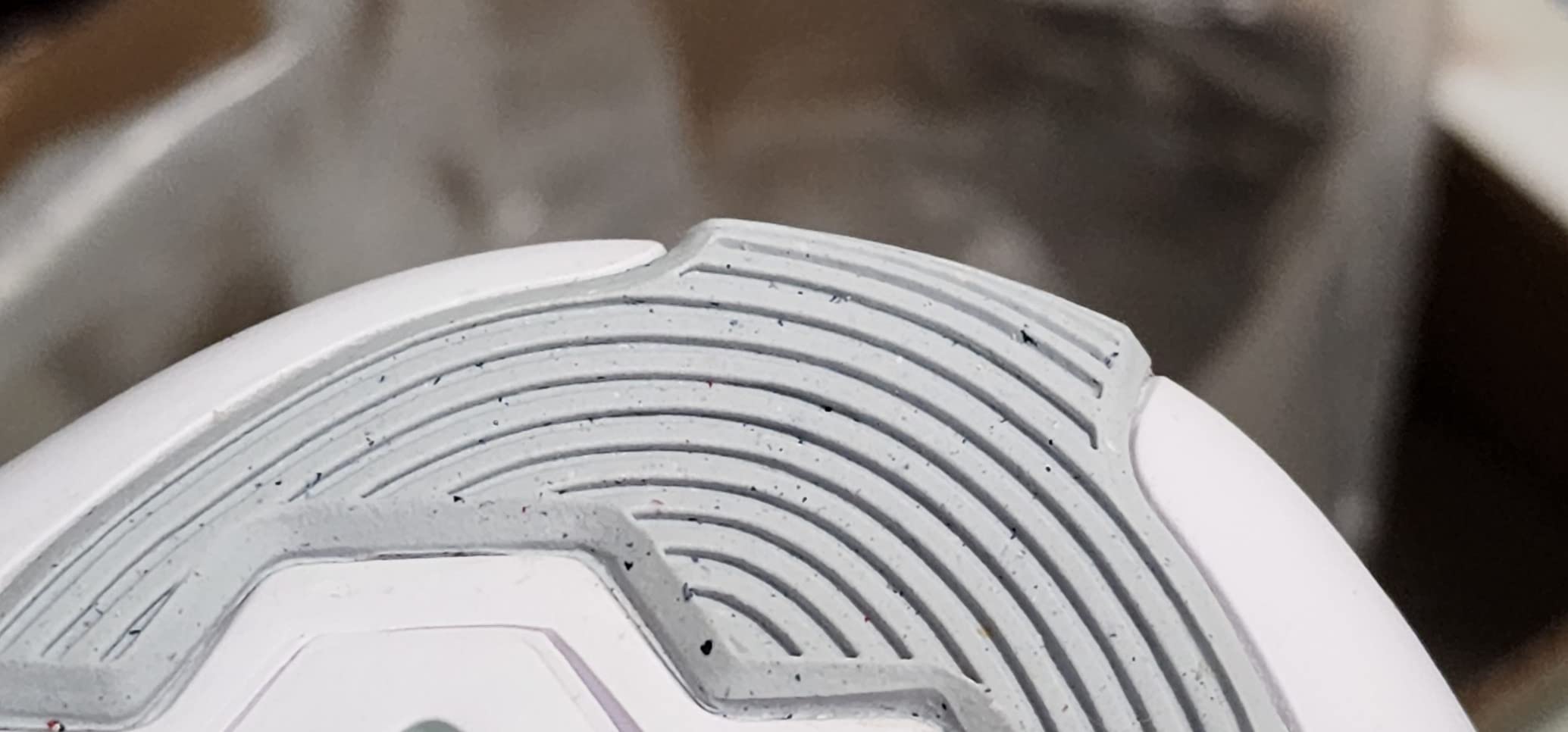 Close-up of Nike Women's Multisport training shoe showing mesh upper construction and Flywire cable system