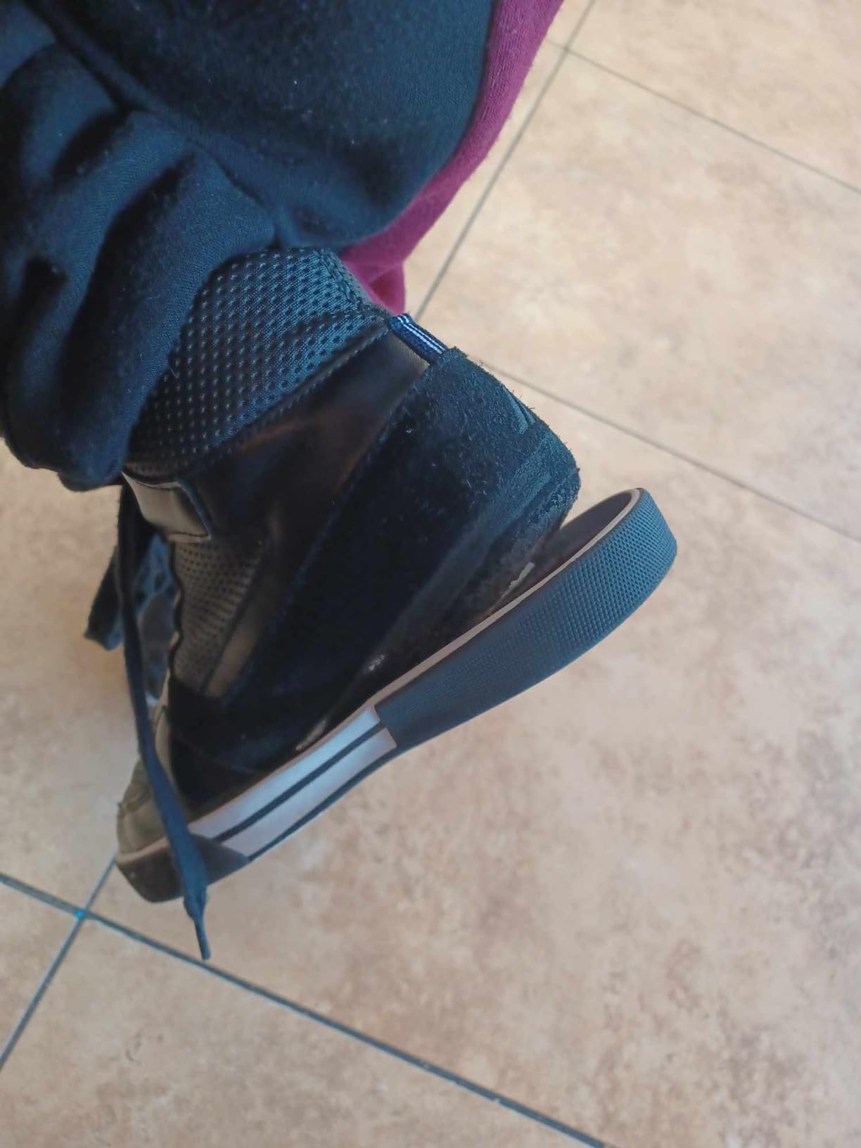 Side-by-side comparison of new Nautica Kids Horizon sneaker versus same shoe after weeks of use showing sole damage