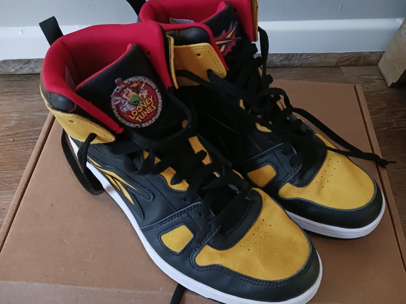 Reebok Resonator Mid leather and suede material detail showing construction and wear characteristics