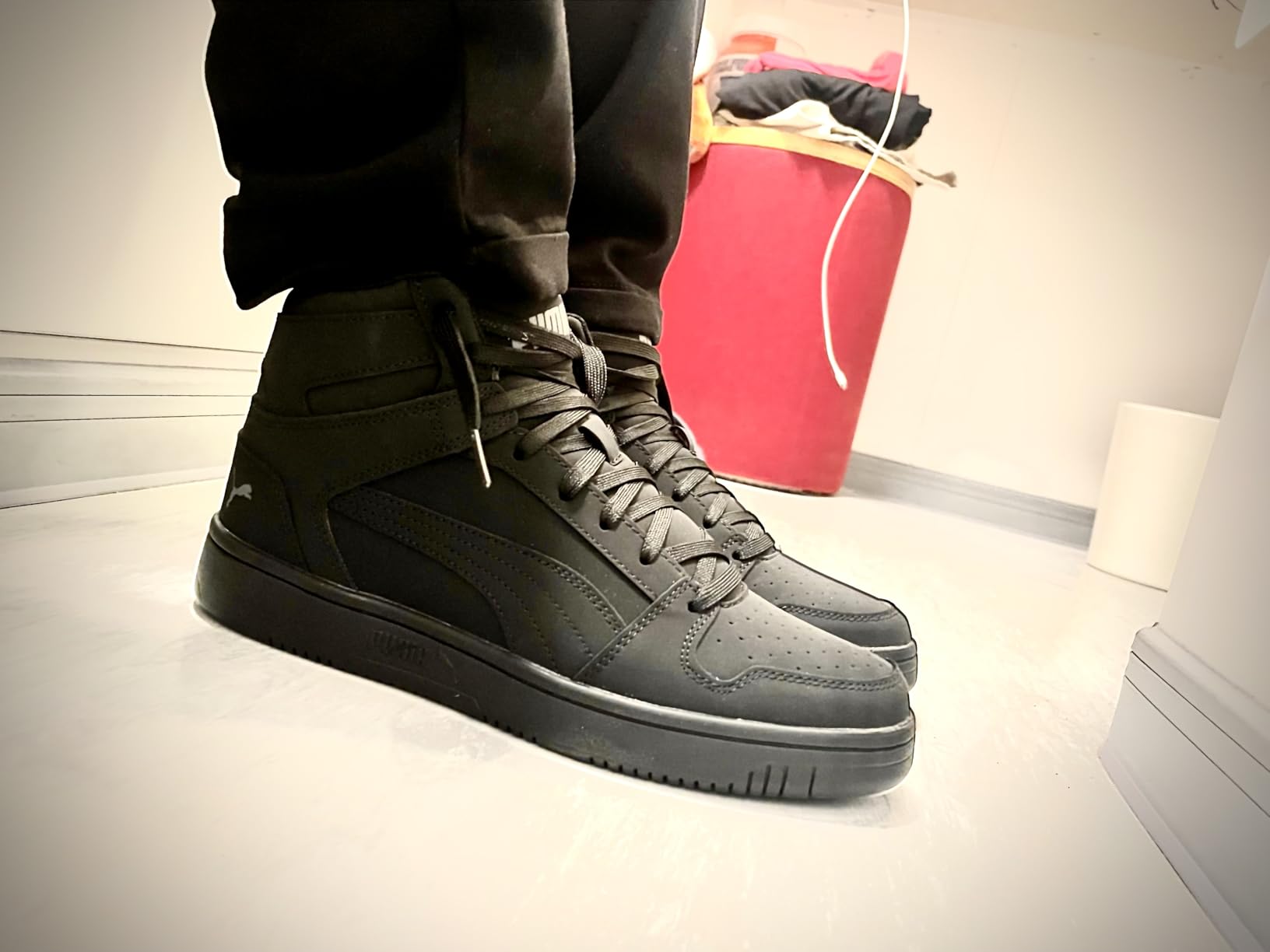 PUMA Rebound Layup worn during various daily activities including casual errands and social outings