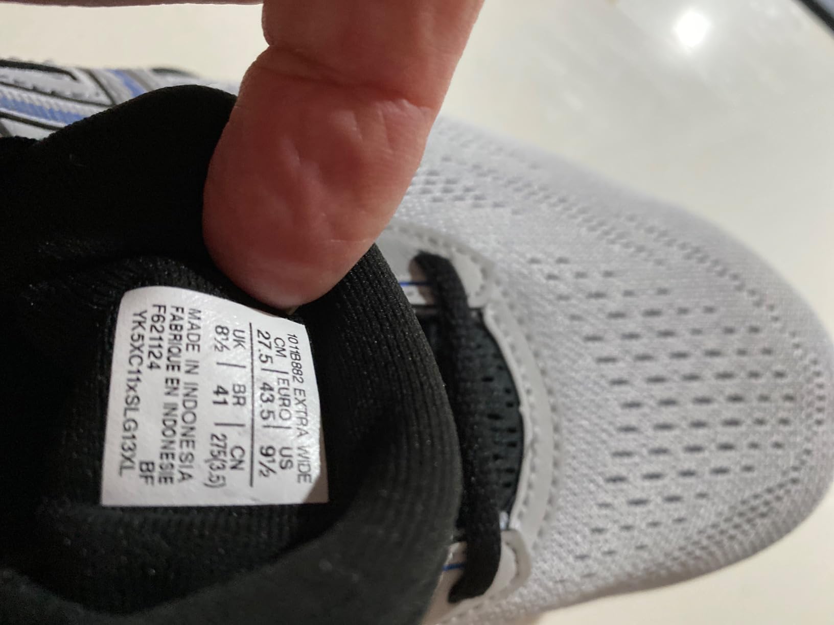 ASICS Gel-Contend 9 showing wide forefoot fit and overall sizing accommodation