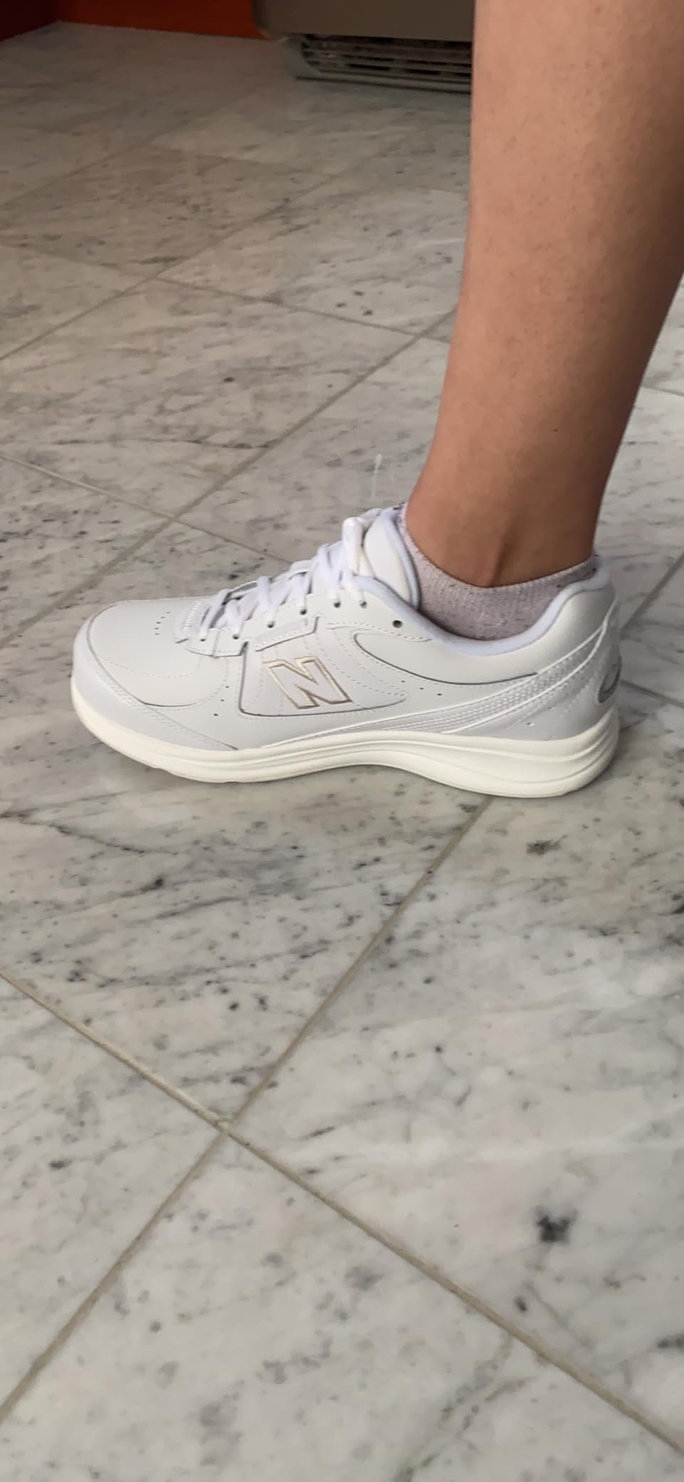 New Balance 577 V1 being worn during walking on pavement surface