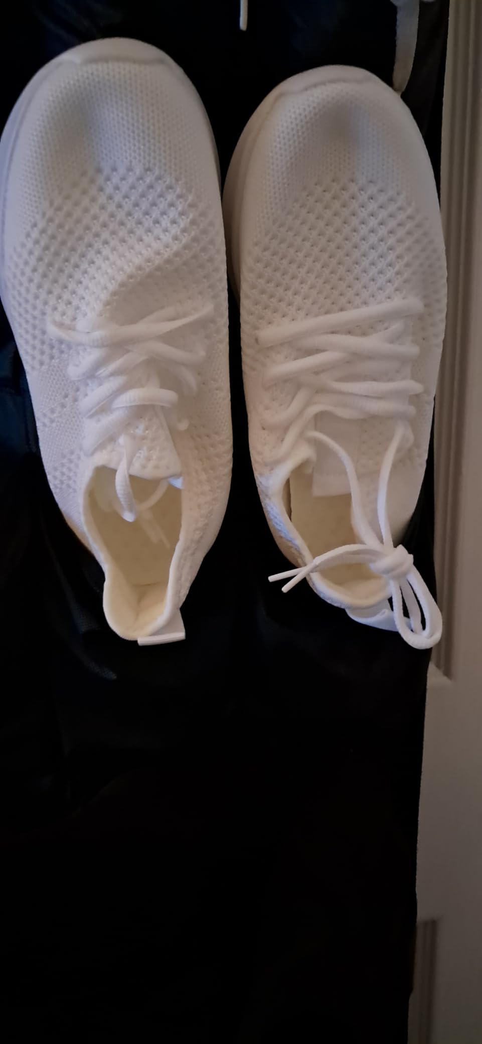 Bottom sole view of WYGRQBN walking shoes showing tread pattern and EVA outsole construction