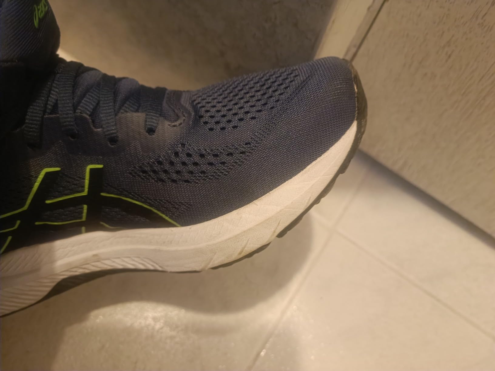 ASICS GT-1000 12 showing engineered mesh upper construction detail