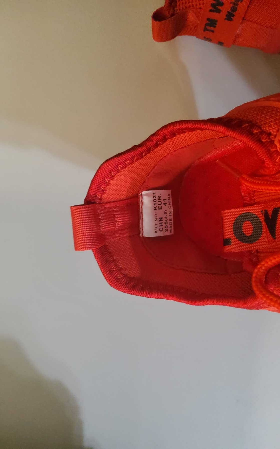 Side profile view showing air cushion sole segments and overall shoe silhouette