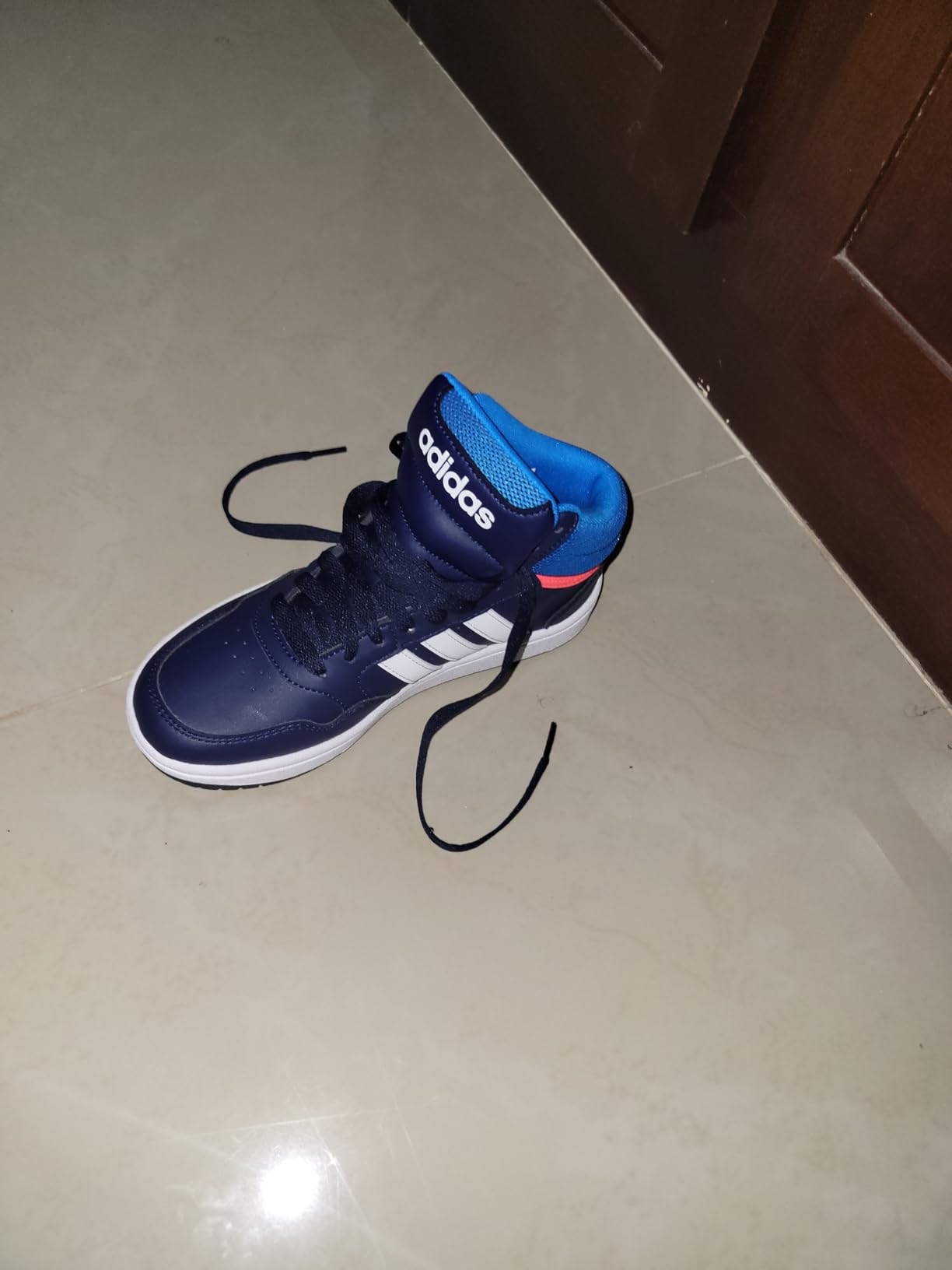 Action shot showing Adidas Hoops 3.0 in court play demonstrating performance during recreational basketball