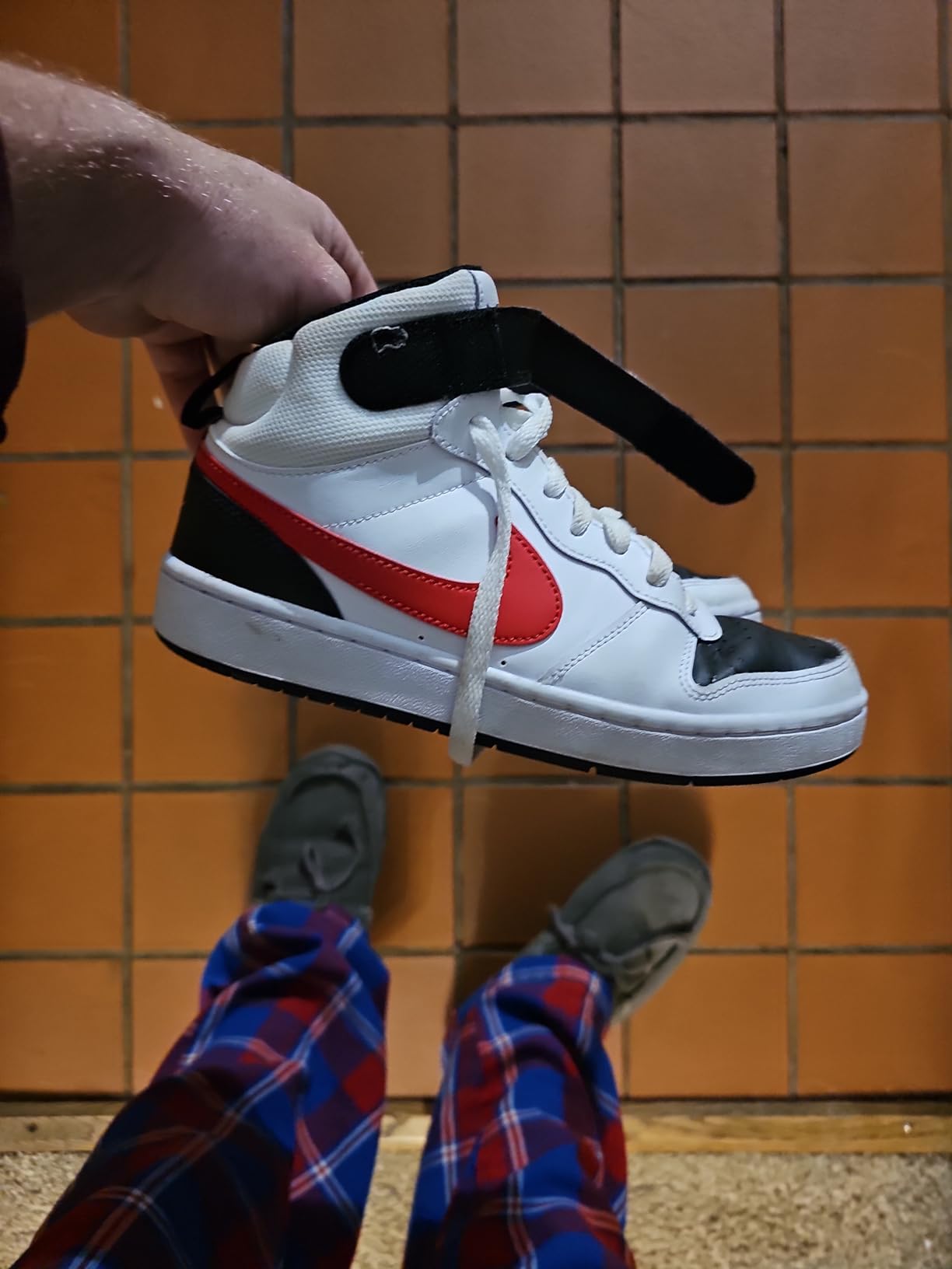 Nike Court Borough Mid 2 side profile showing mid-top ankle support and rubber outsole
