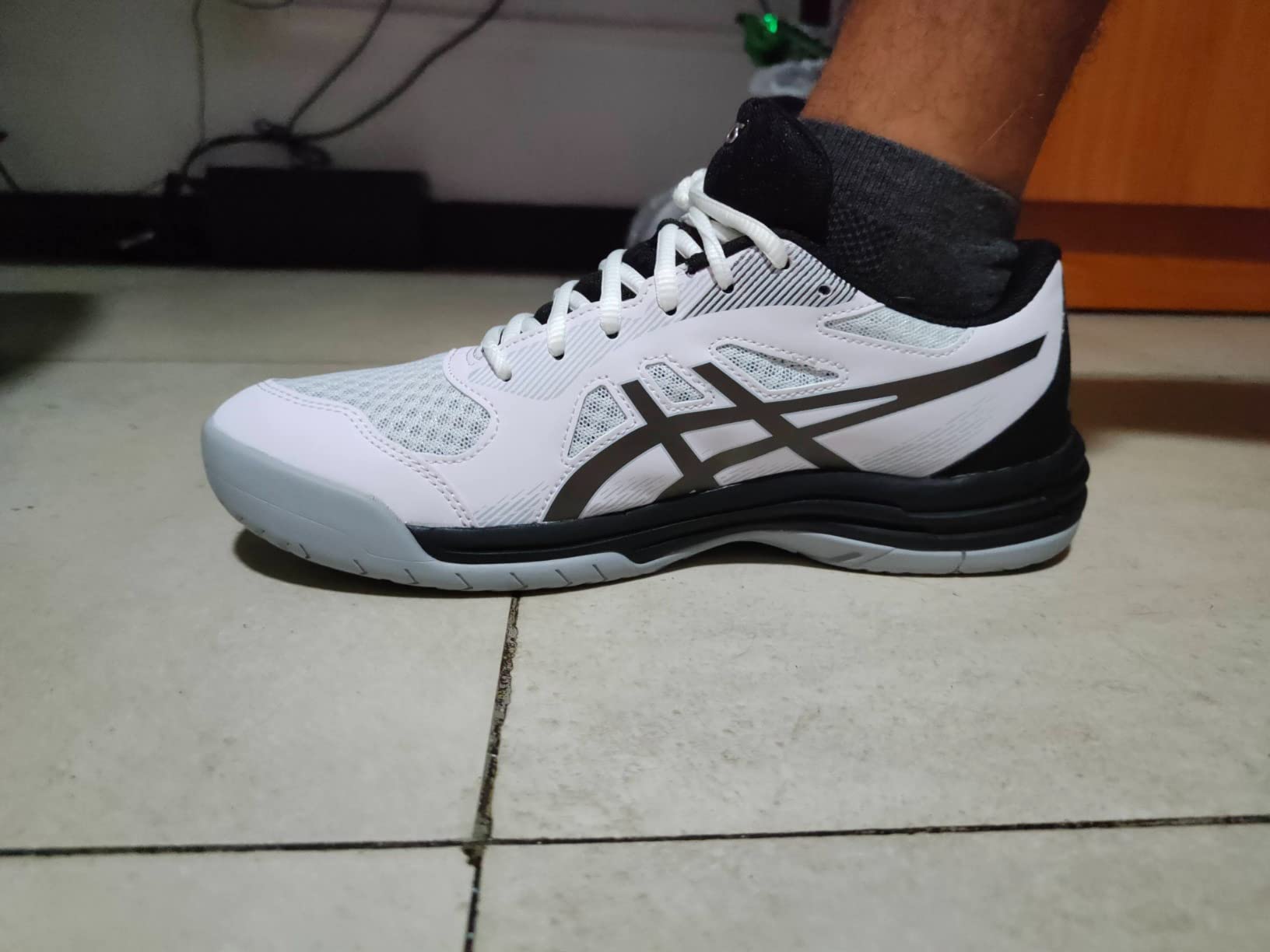 ASICS Upcourt 5 multiple angle view showing white safety yellow colorway and mesh construction from different perspectives