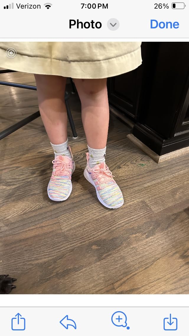 RUNSIDE Girls Tennis Shoes in active use by child during everyday activities