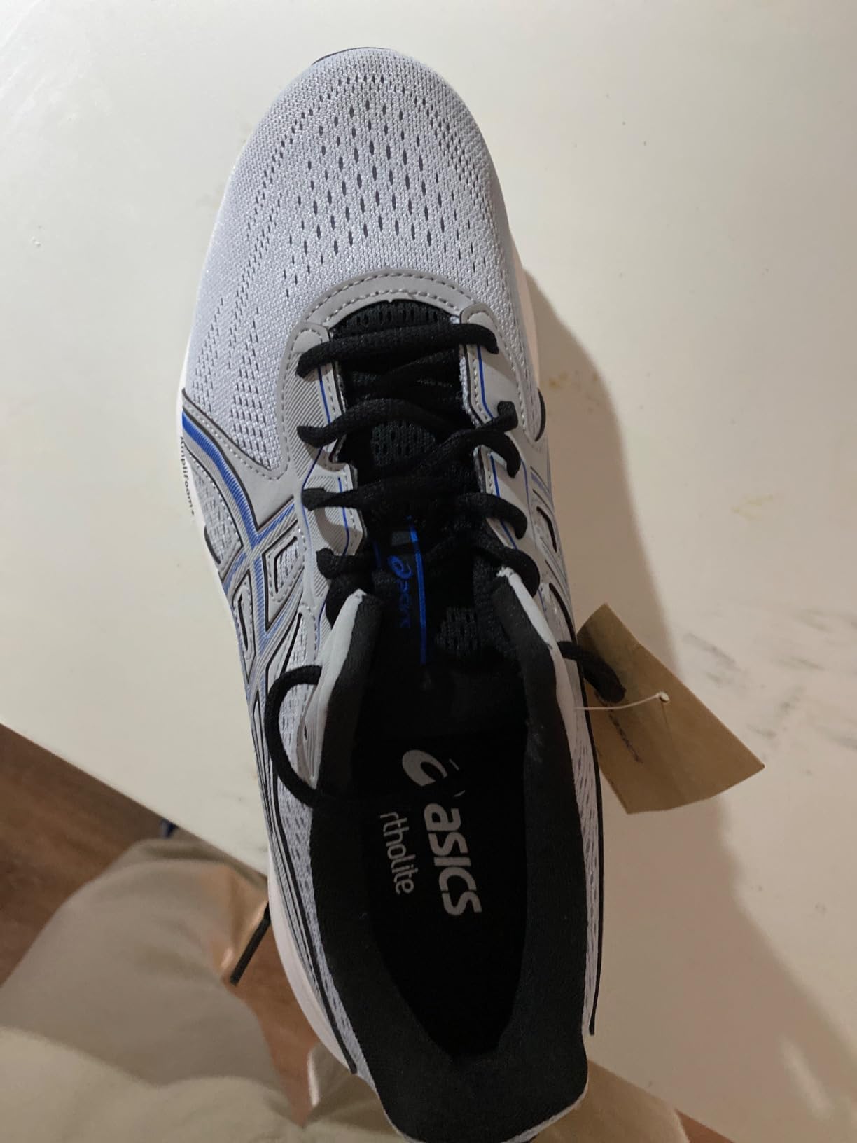 ASICS Gel-Contend 9 demonstrating wide foot accommodation and overall fit profile